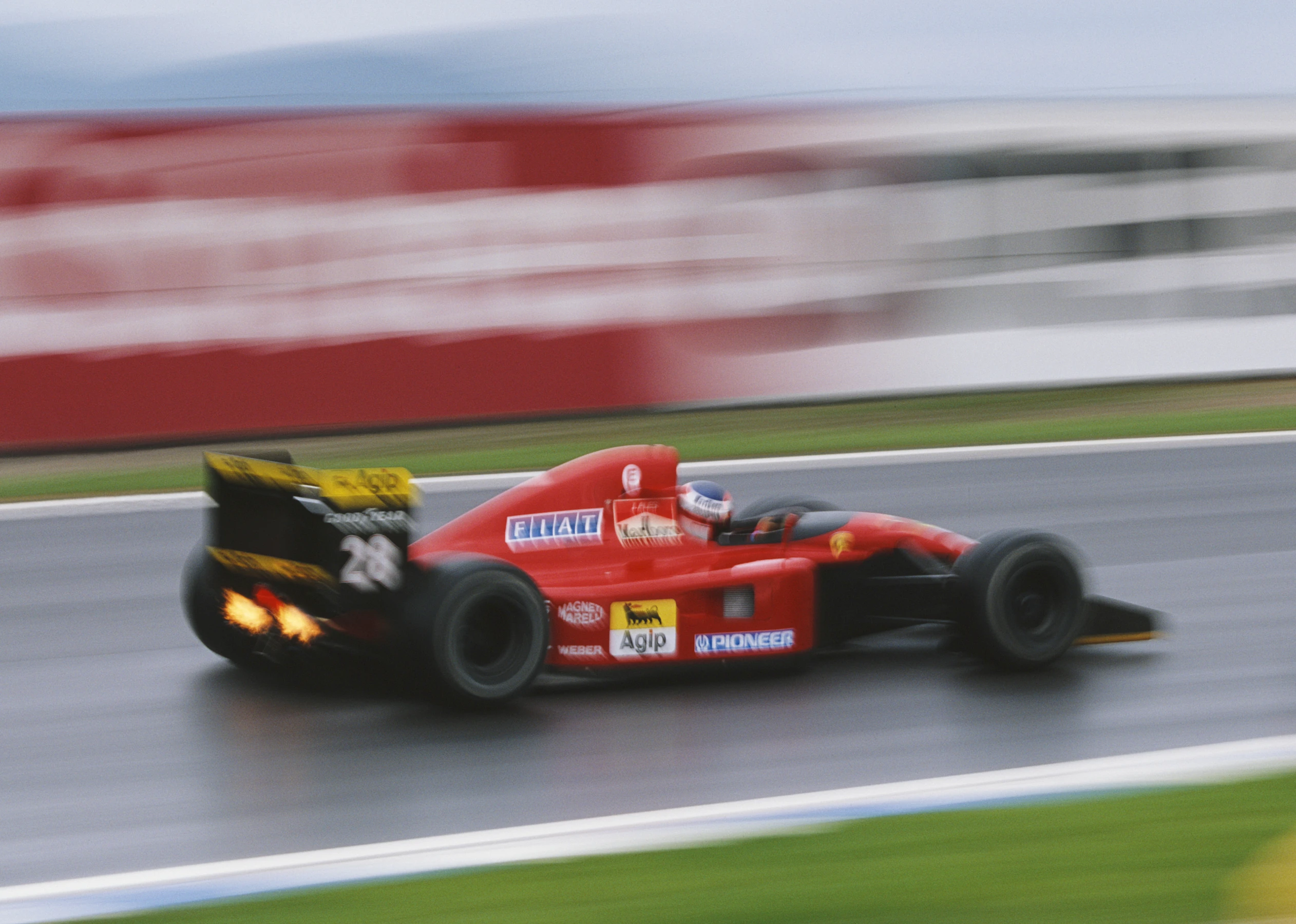 Jean Alesi of France drives the #28 Scuderia Ferrari SpA Ferrari 642/2 Ferrari V12 at speed during