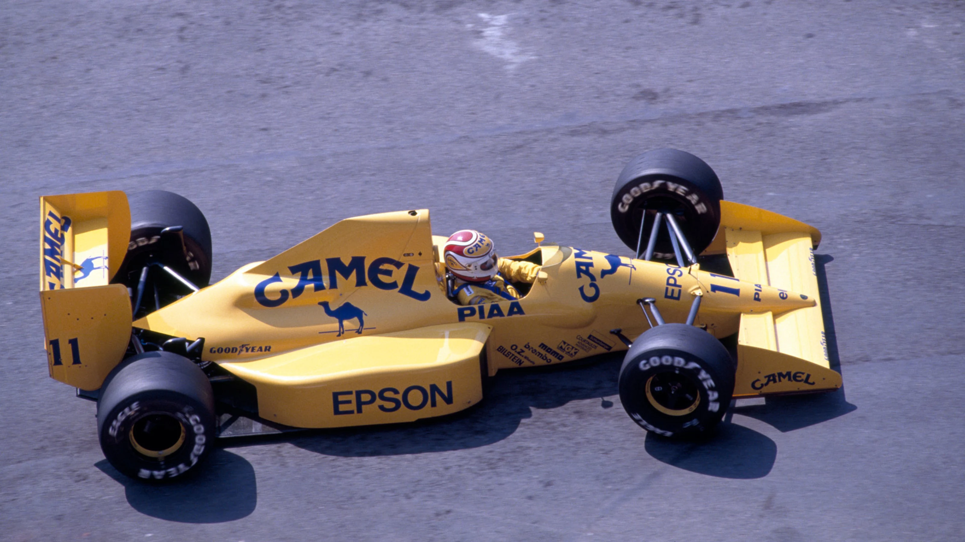 Nelson Piquet of Brazil in action, driving a Lotus 101 with a Judd V8 engine for Camel Team Lotus,