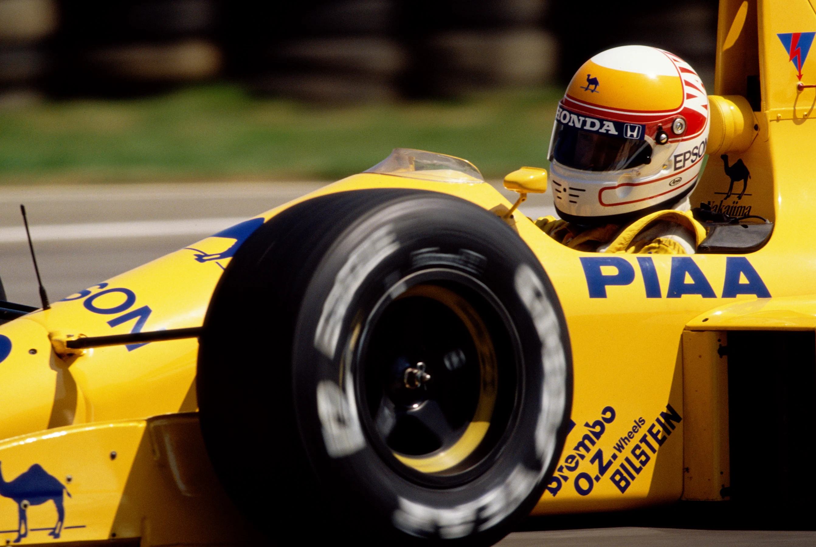 Satoru Nakajima of Japan drives the Lotus-Judd 101 during  the British Grand Prix on 16 July 1989