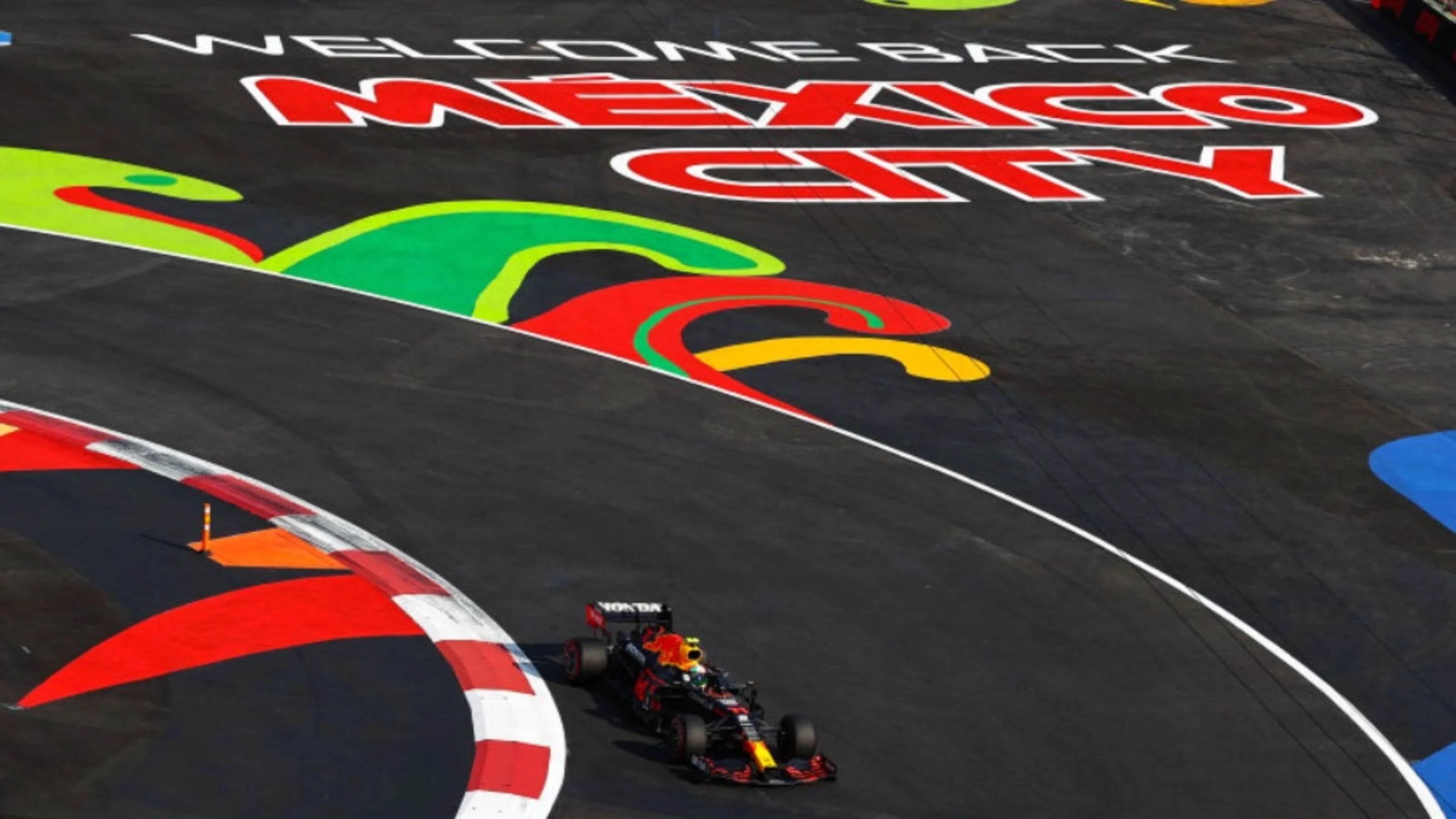 MEXICO CITY, MEXICO - NOVEMBER 05: Sergio Perez of Mexico driving the (11) Red Bull Racing RB16B