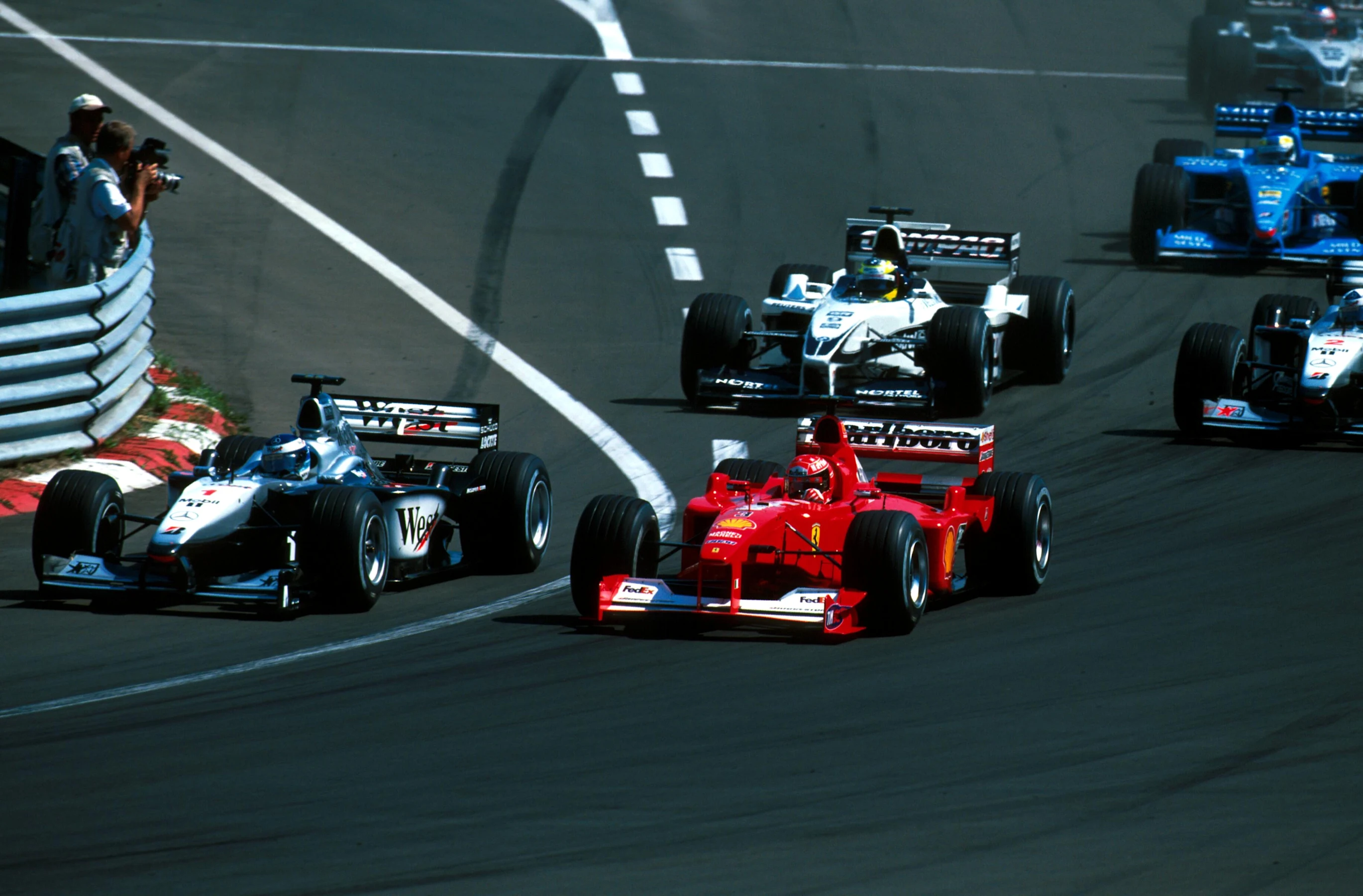 Winner Mika Hakkinen(FIN) Mclaren MP4-15 gets the jump on Schumacher at the start Hungarian GP,