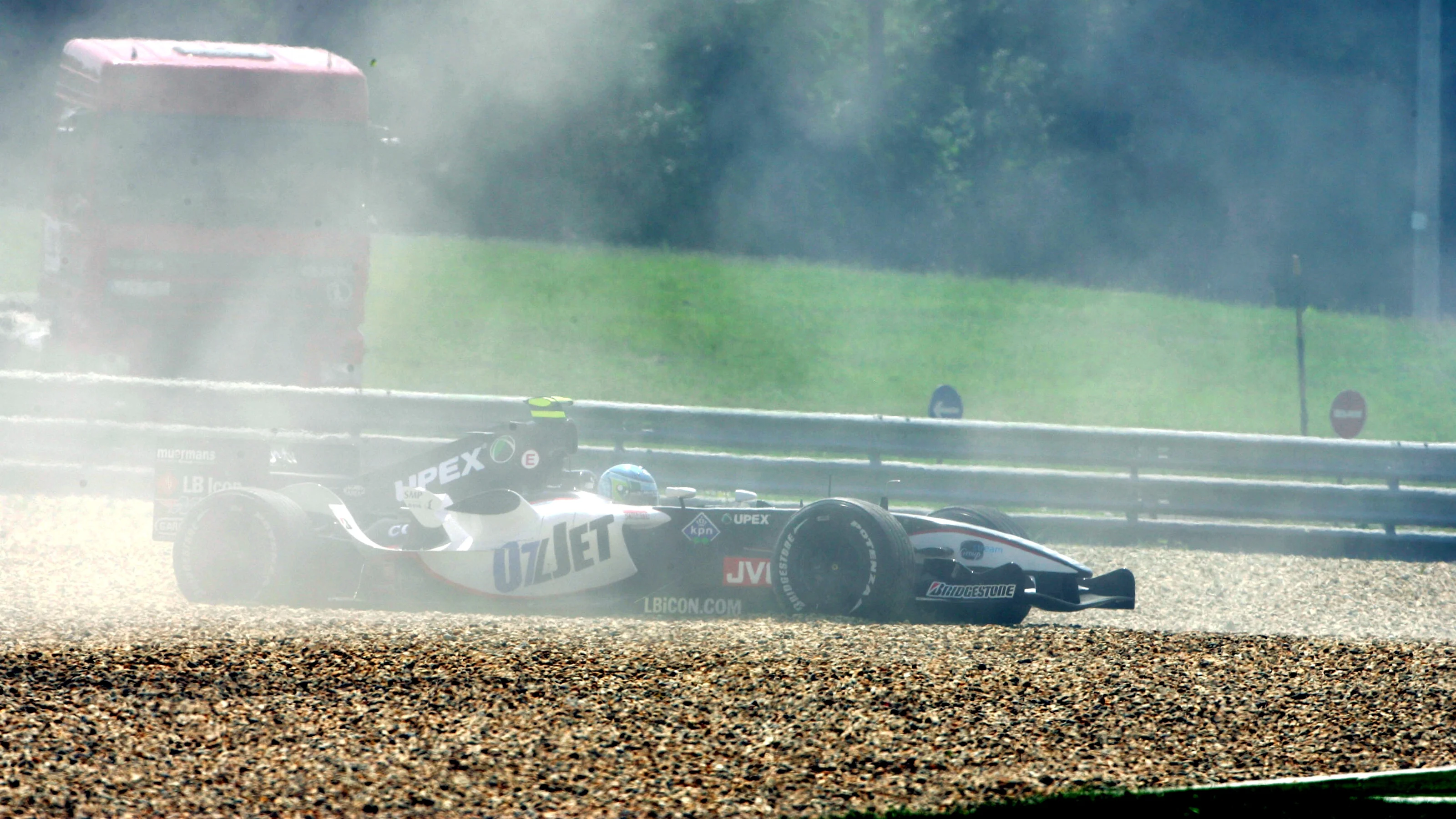 Chanoch Nissany (ISR) Minardi Test Driver spins into the gravel. Formula One World Championship,