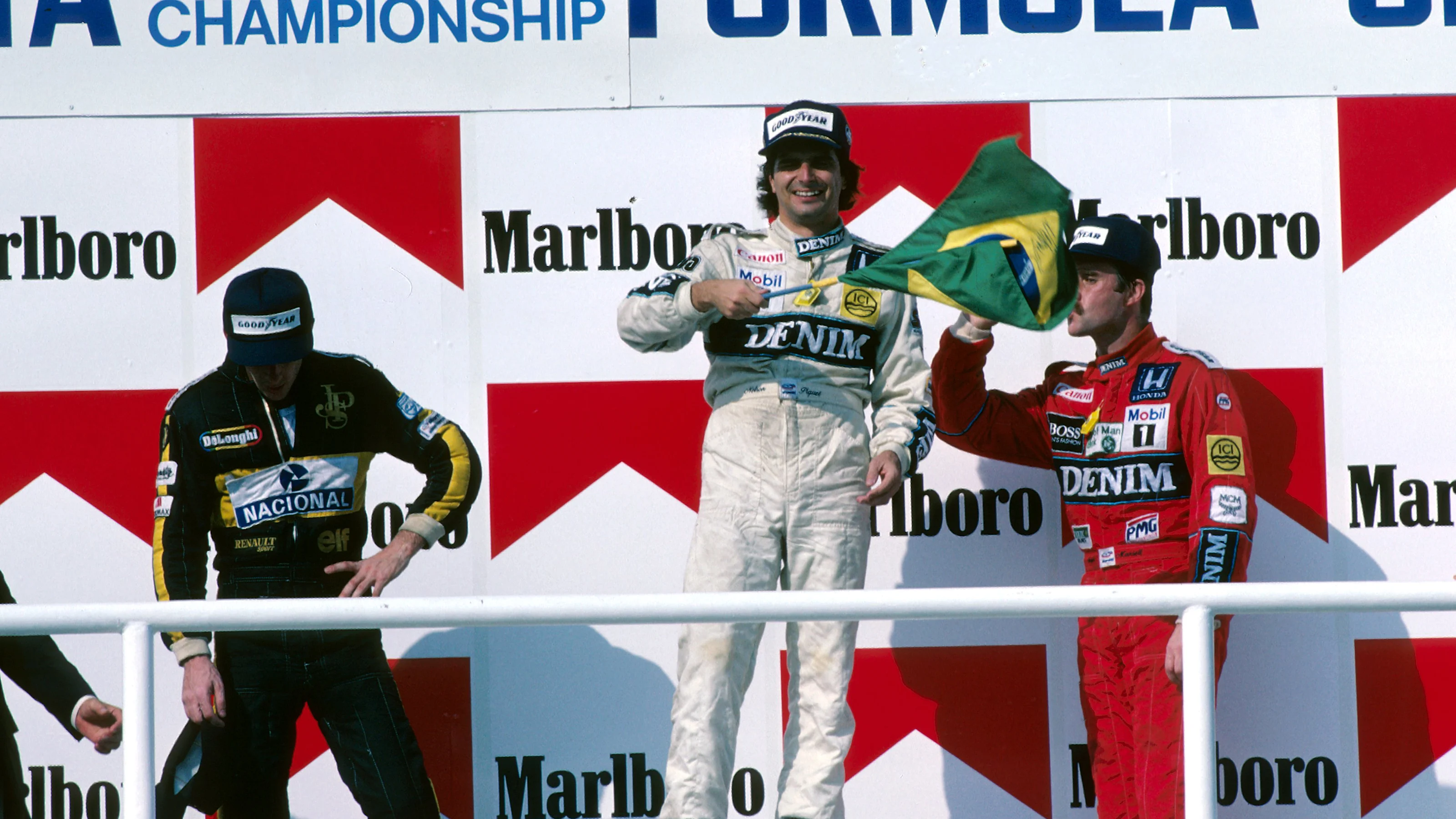 Podium and Results: first Nelson Piquet (BRA) Williams middle, second Ayrton Senna (BRA) Lotus left
