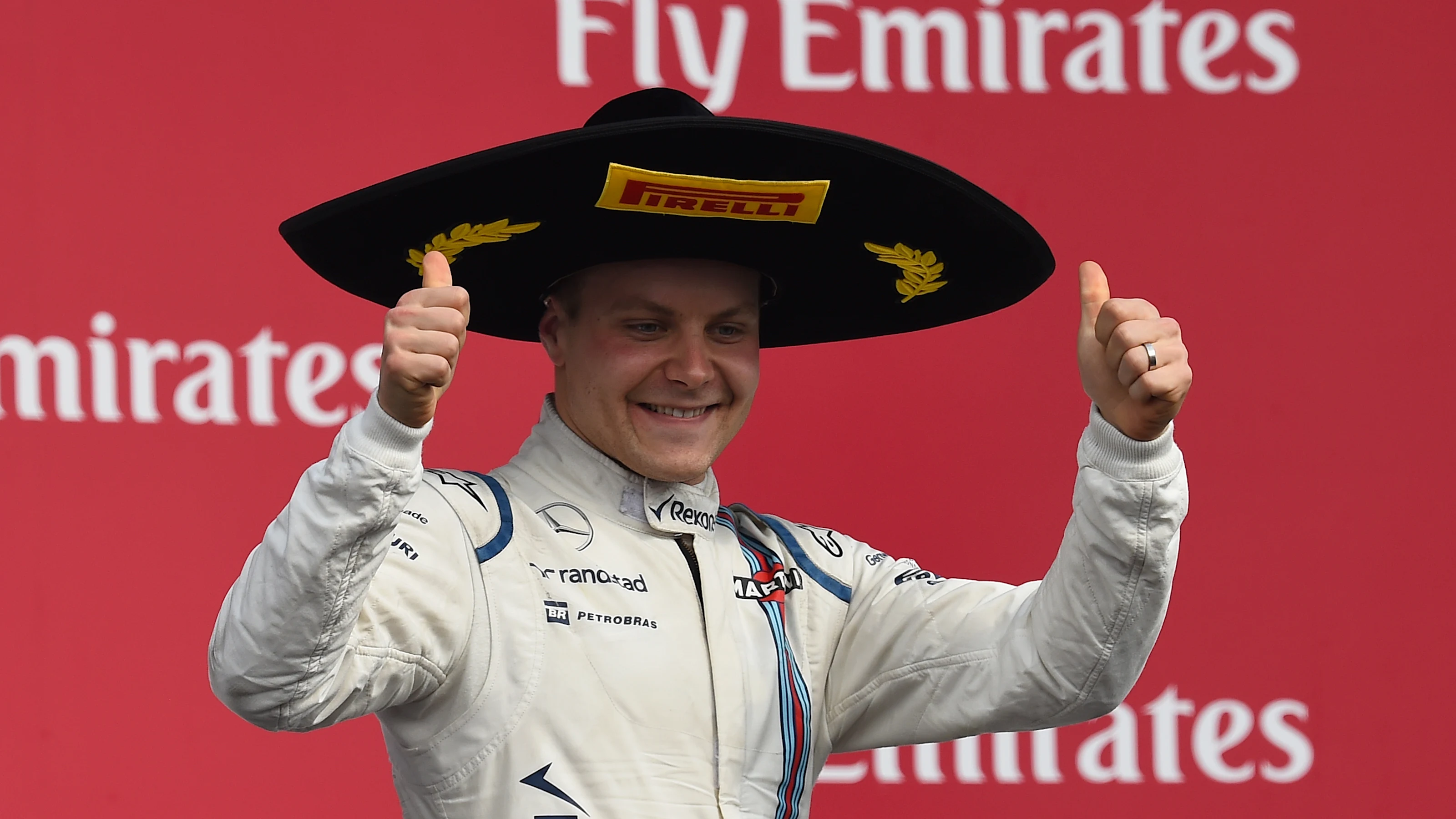 Valtteri Bottas (FIN) Williams celebrates on the podium at Formula One World Championship, Rd17,