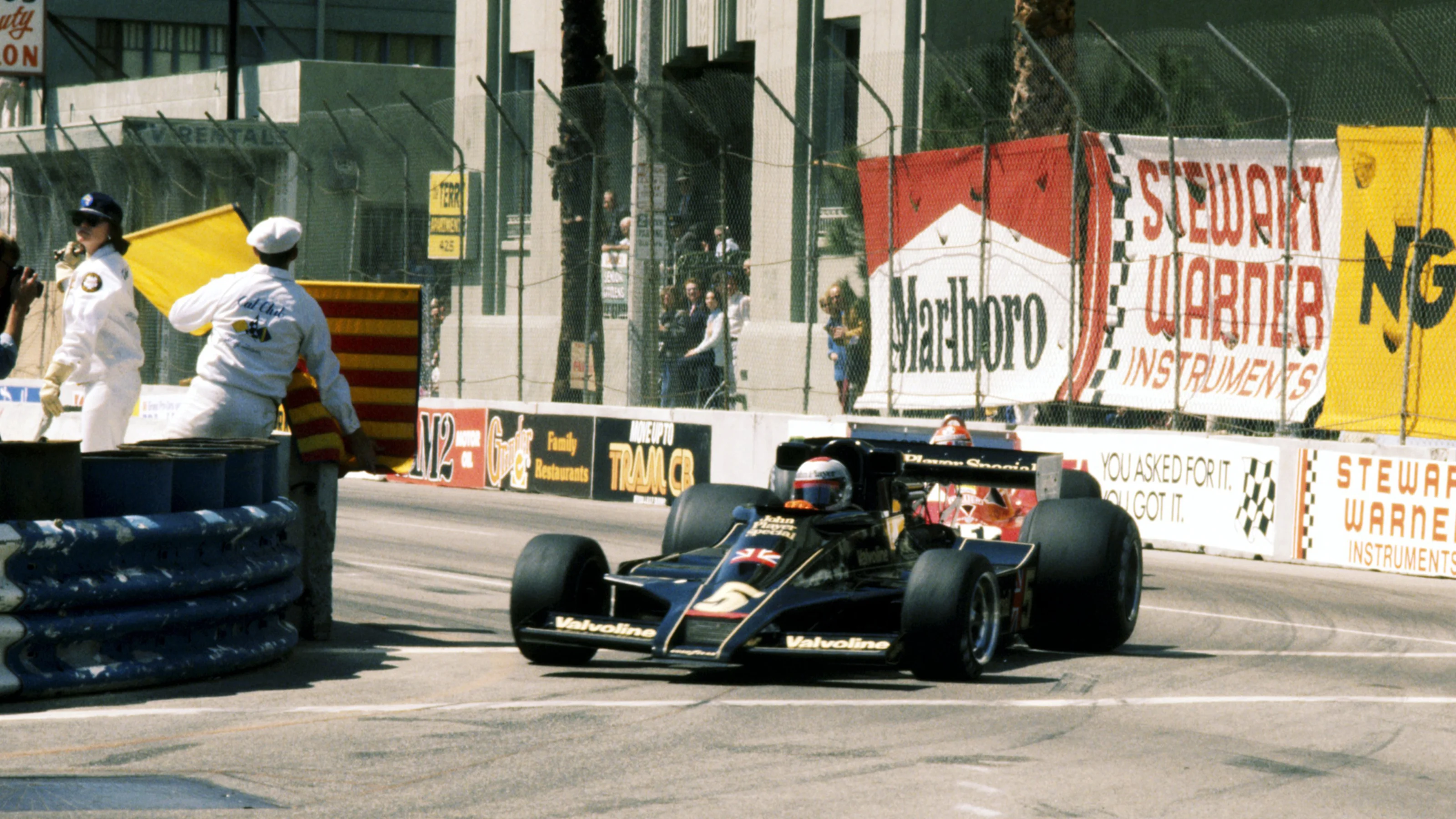 Race winner Mario Andretti (USA) Lotus 78 leads Niki Lauda (AUT) Ferrari 312T2, who finished the