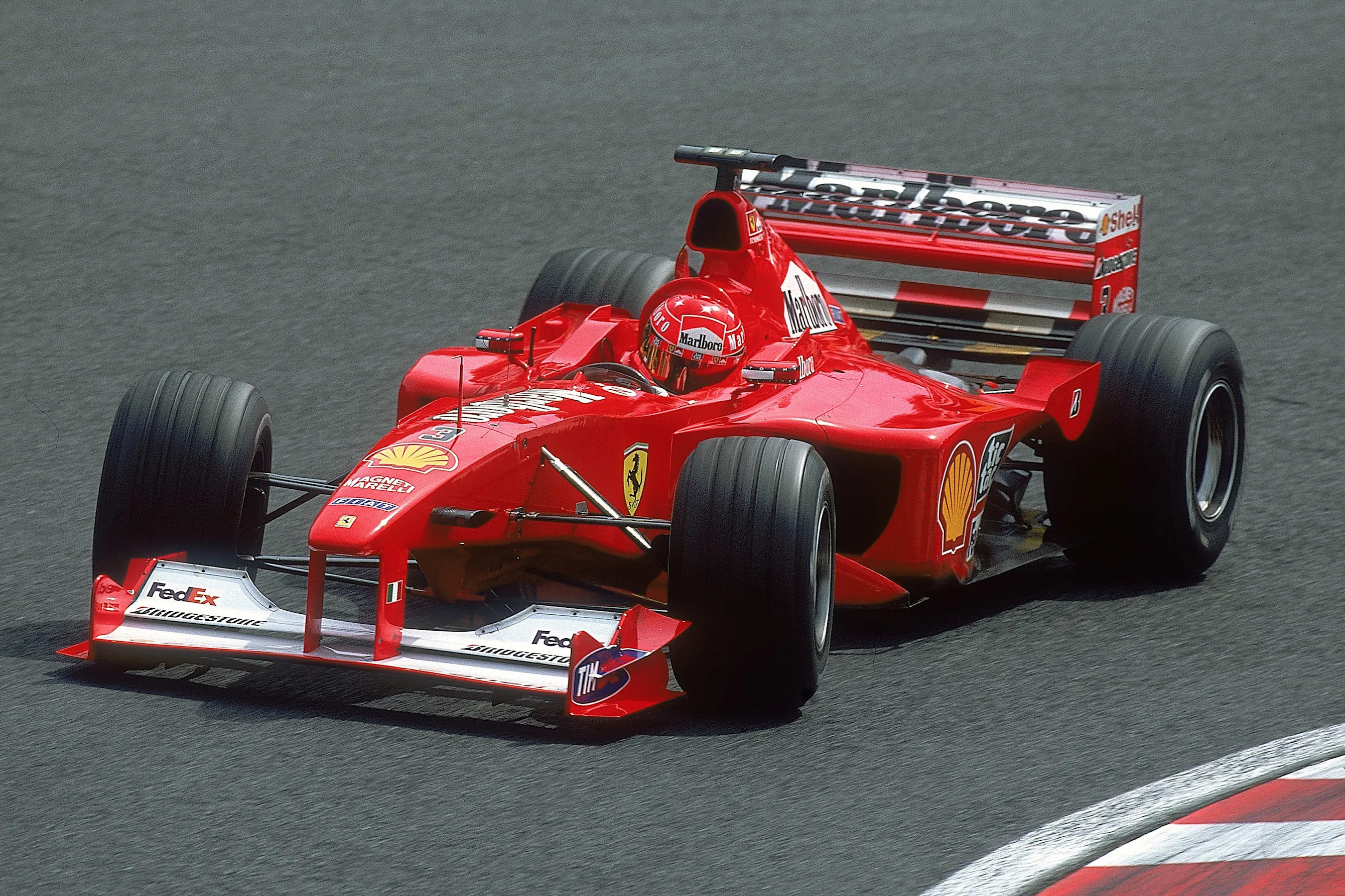 8 Oct 2000:  Michael Schumacher of Germany and Ferrari in action during the Japanese Formula One