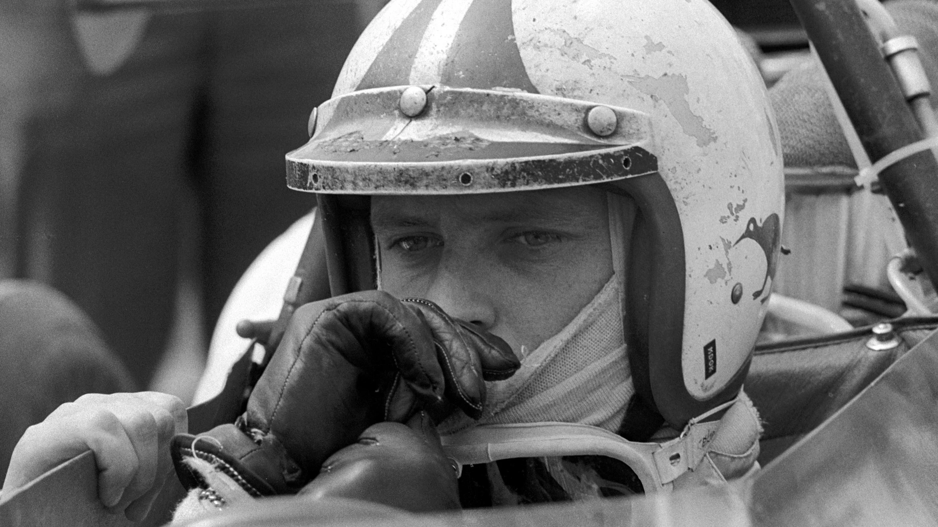 Chris Amon (NZL) Ferrari 312 in reflective mood, retired with broken gearbox. British Grand Prix,