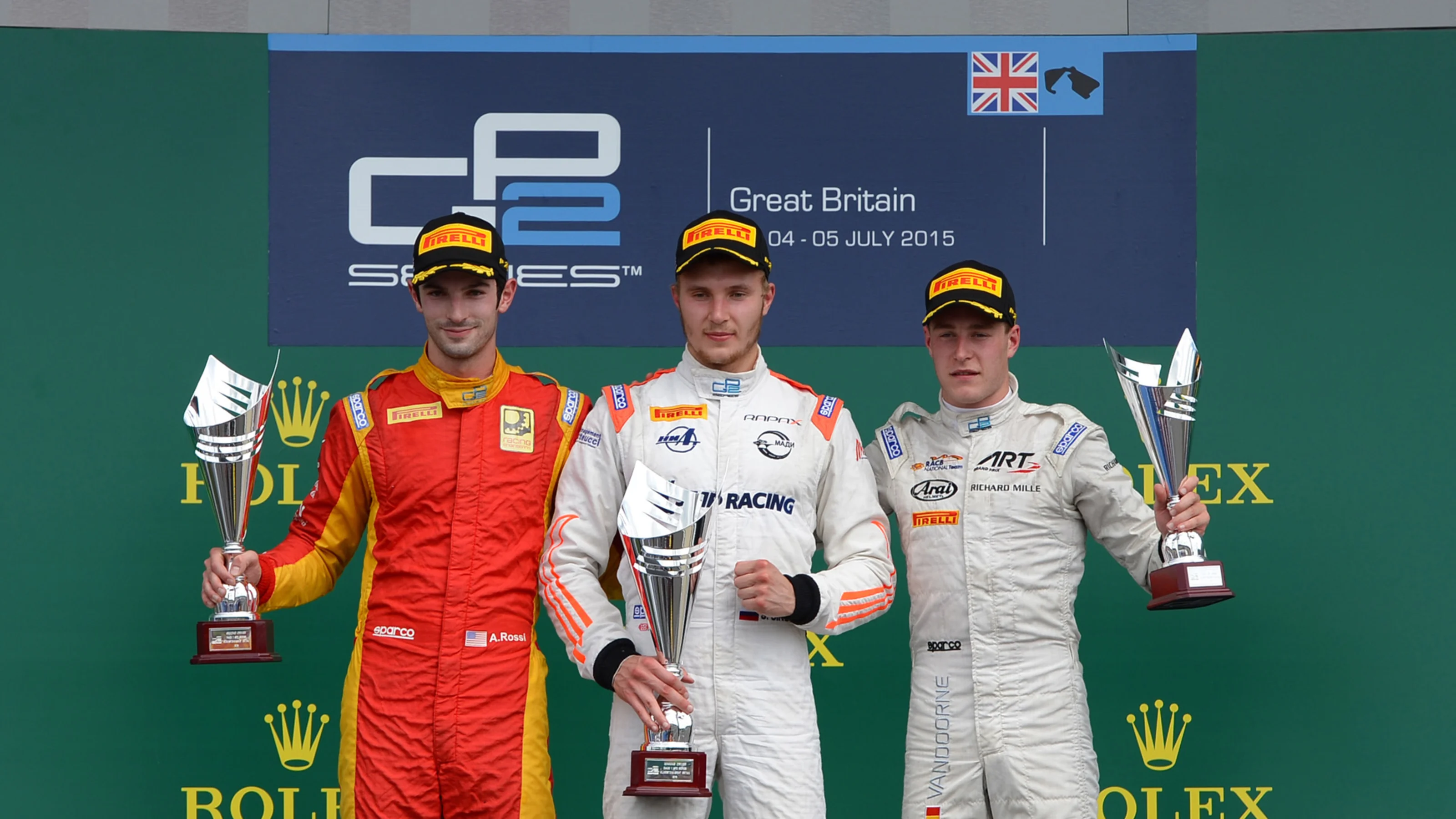 Podium (L to R): Second placed Alexander Rossi (USA) Racing Engineering, race winner Sergey
