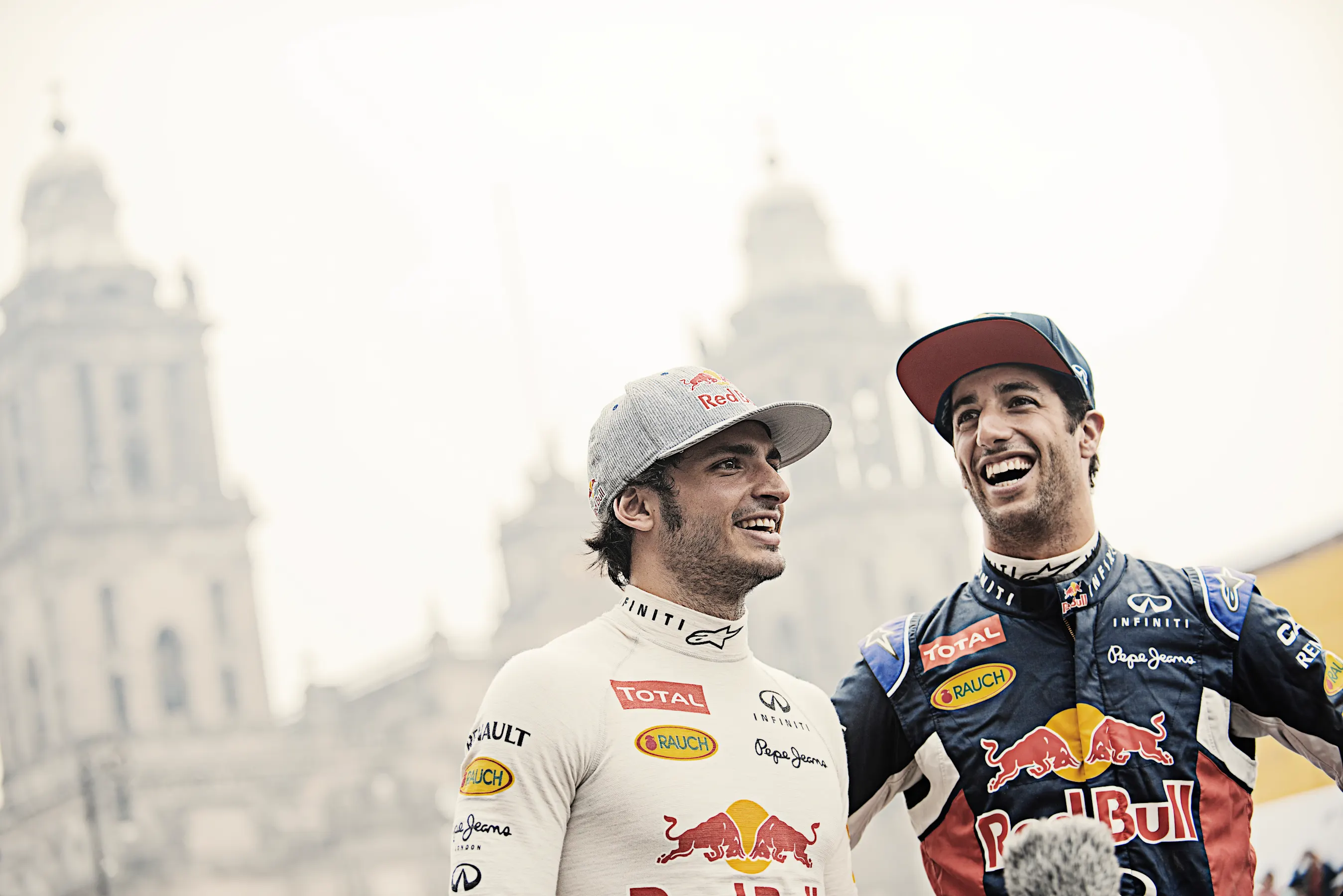 Carlos Sainz and Daniel Ricciardo joking around before their performance during the Red Bull F1