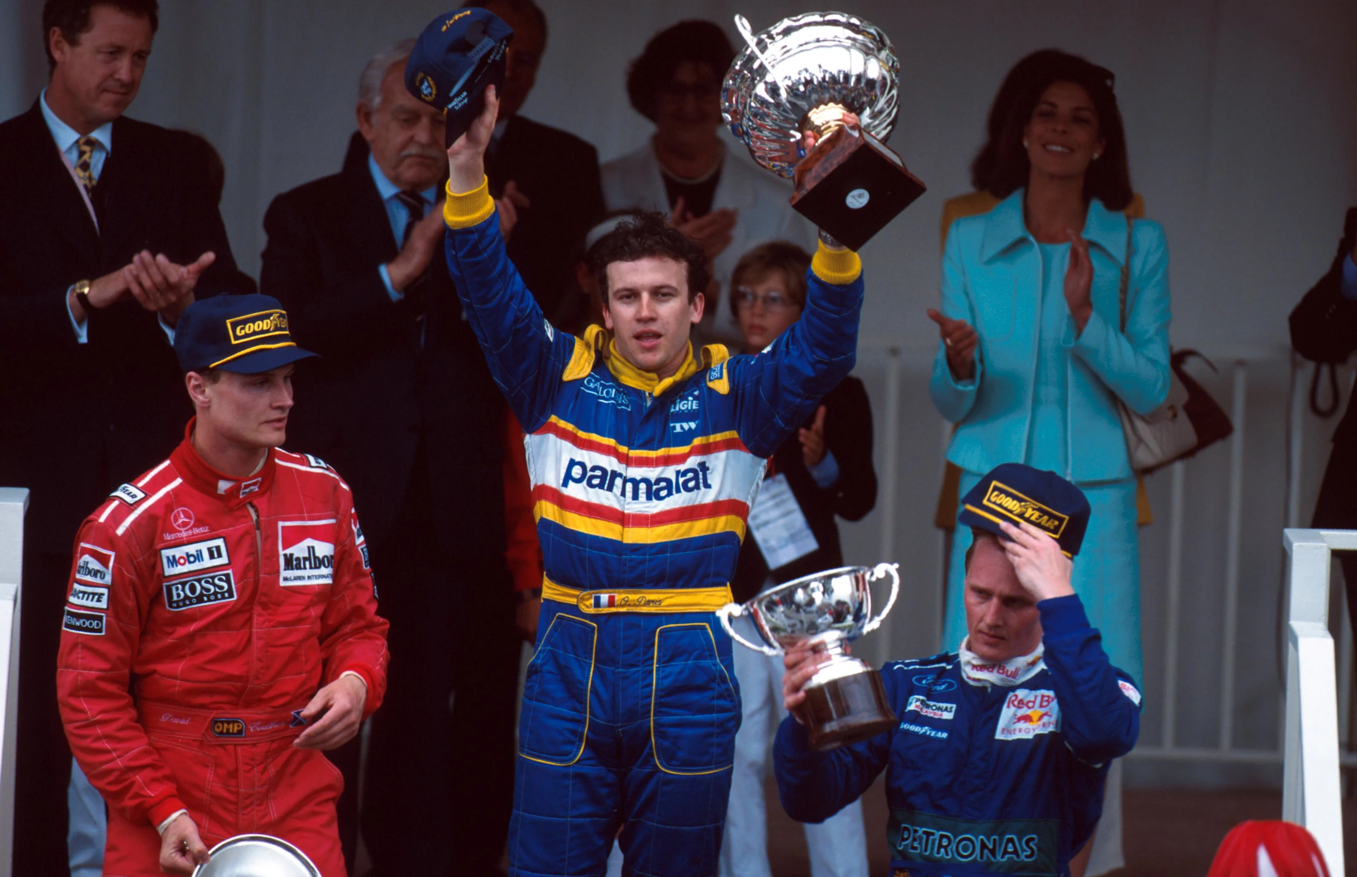 L to R: David Coulthard 2nd Winner Olivier Panis and Johnny Herbert 3rd Monaco Grand Prix, Monte