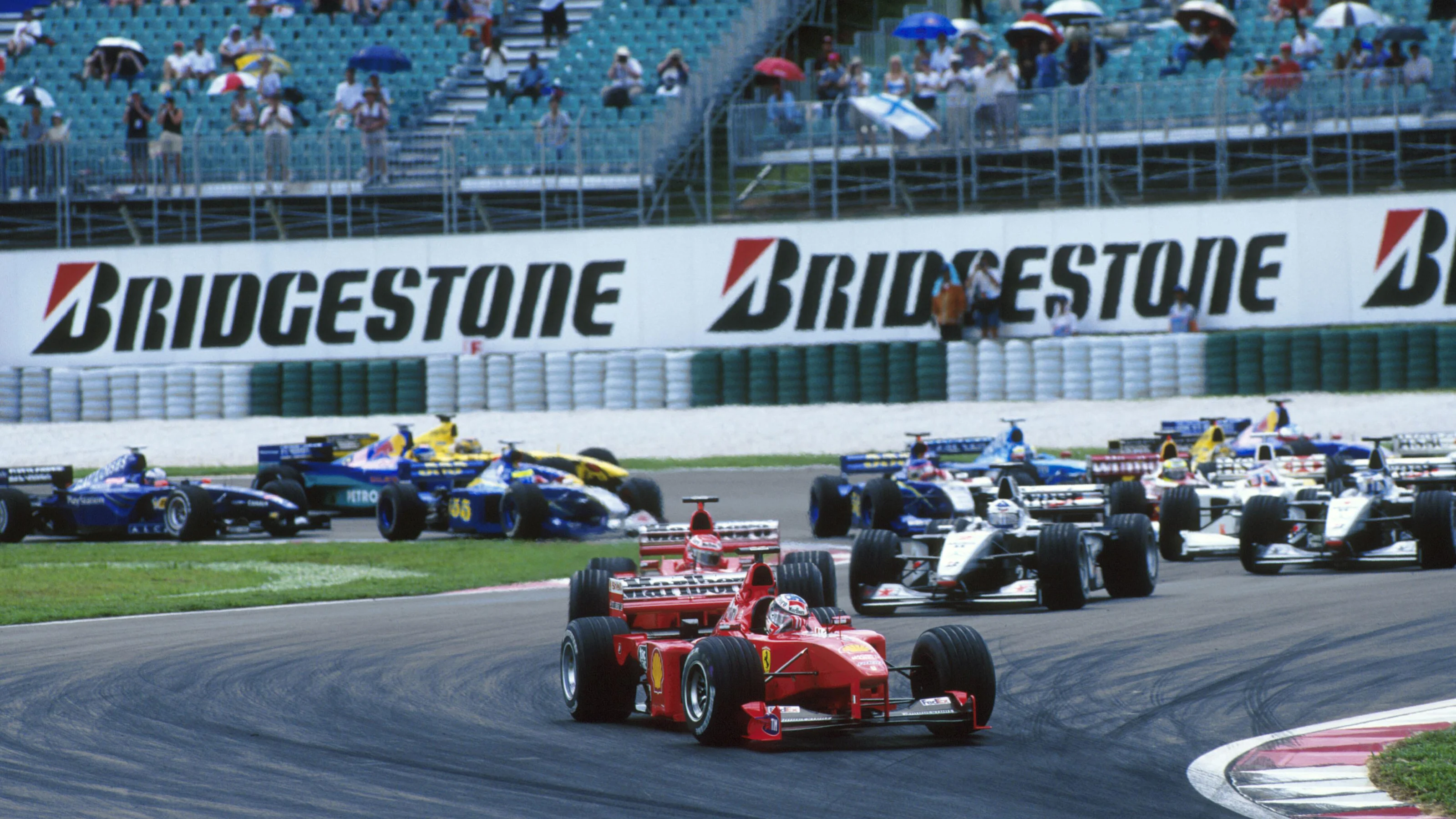 Schumacher leads at the start Malaysian GP, Sepang, 17 October 1999