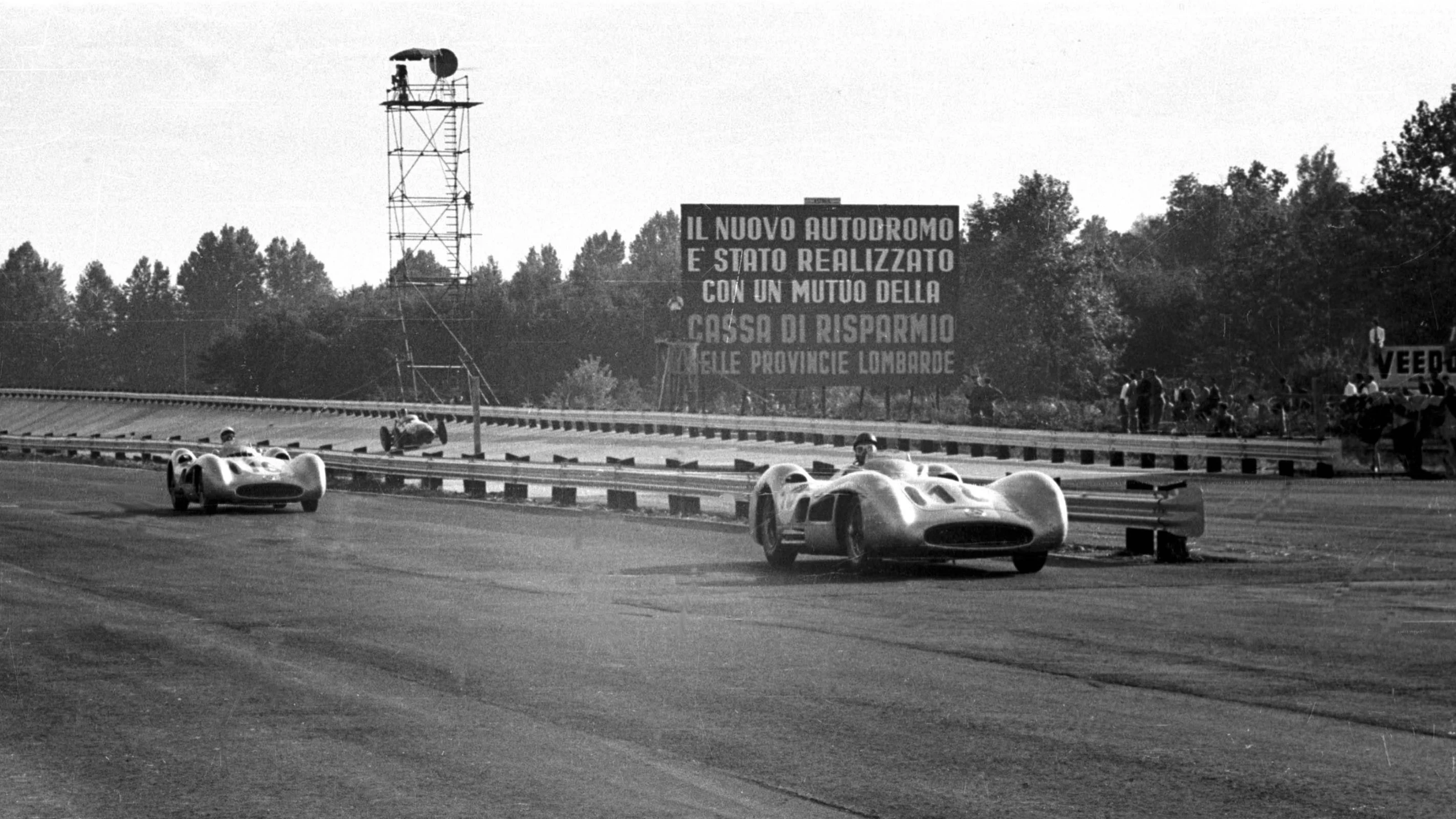 1955 Italian Grand Prix, Monza Winner Juan Manuel Fangio leads Strirling Moss (both stream-lined