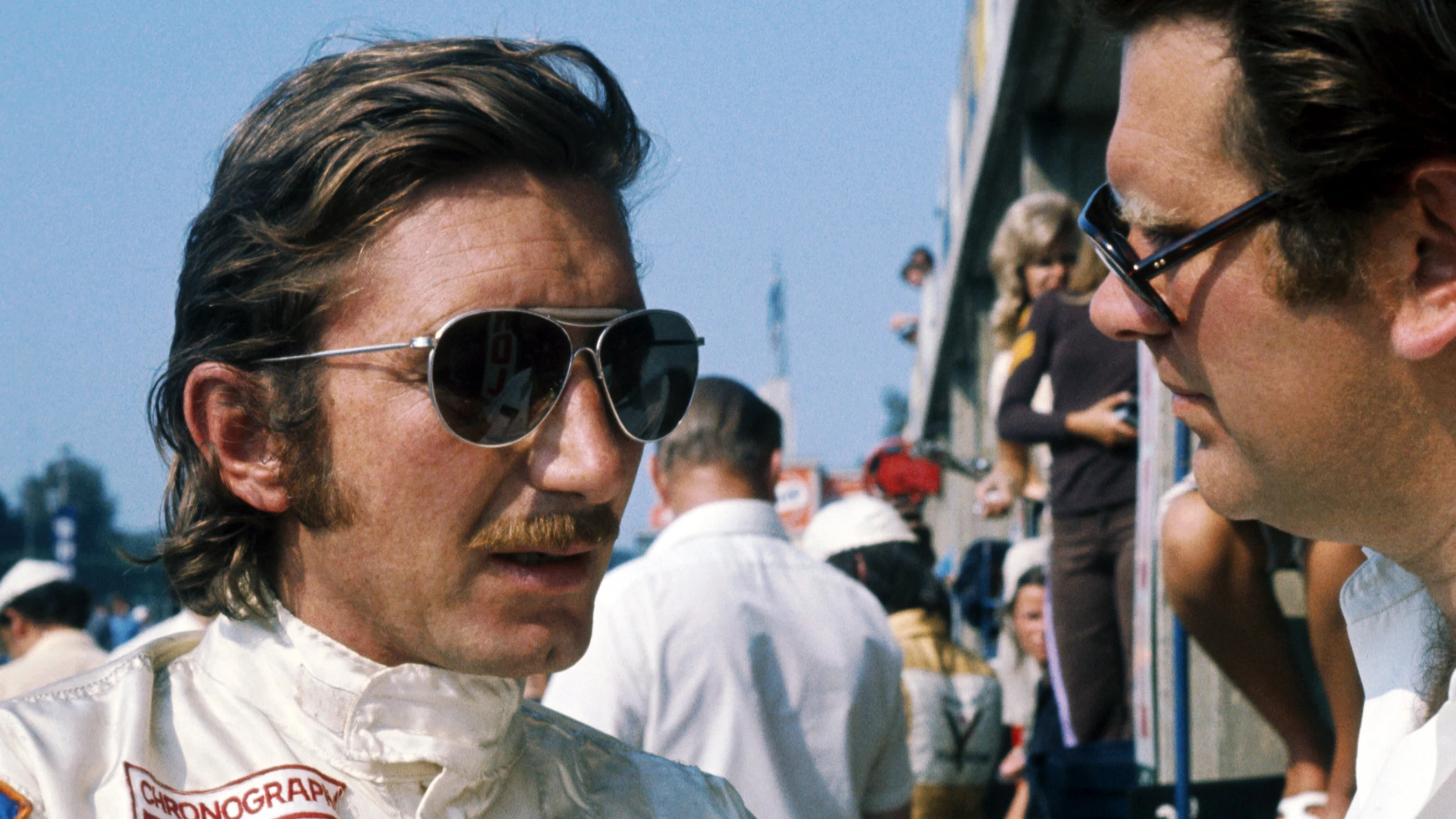 L-R Jo Siffert (SUI) BRM and  team manager Tim Parnell (GBR).

1971 Formula One World