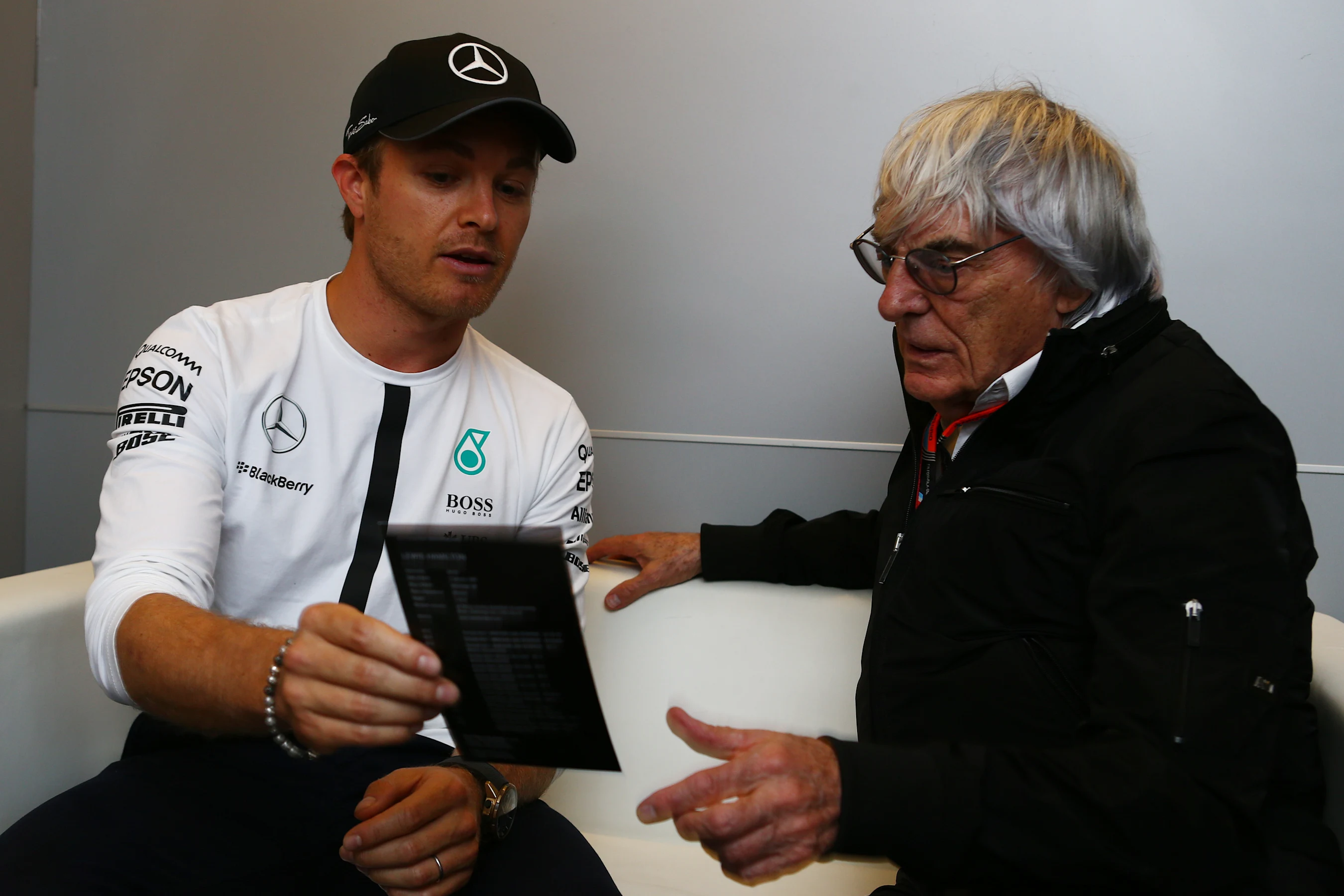 Mercedes' Nico Rosberg in conversation with Formula One group CEO Bernie Ecclestone, Monaco, May