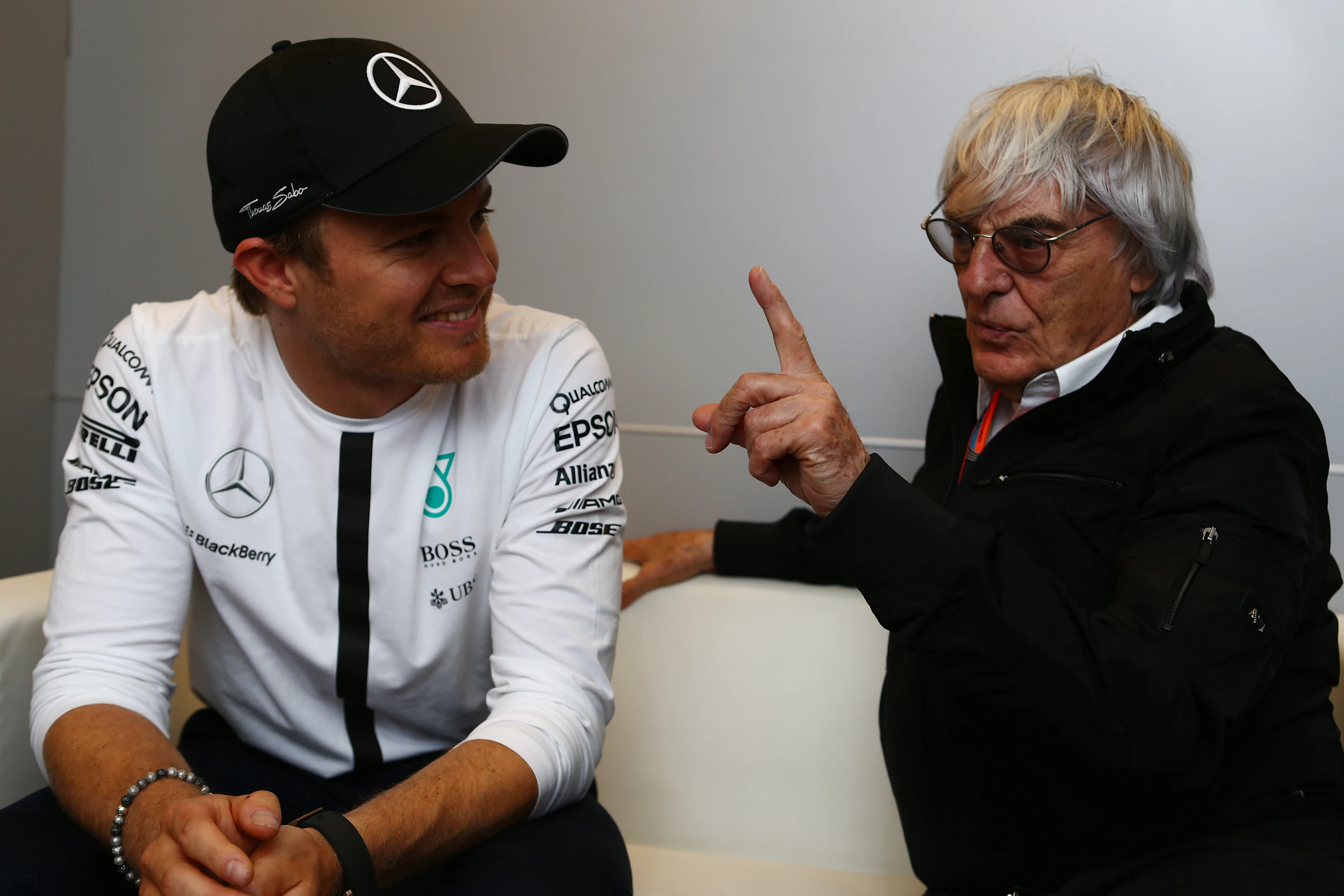 Mercedes' Nico Rosberg in conversation with Formula One group CEO Bernie Ecclestone, Monaco, May