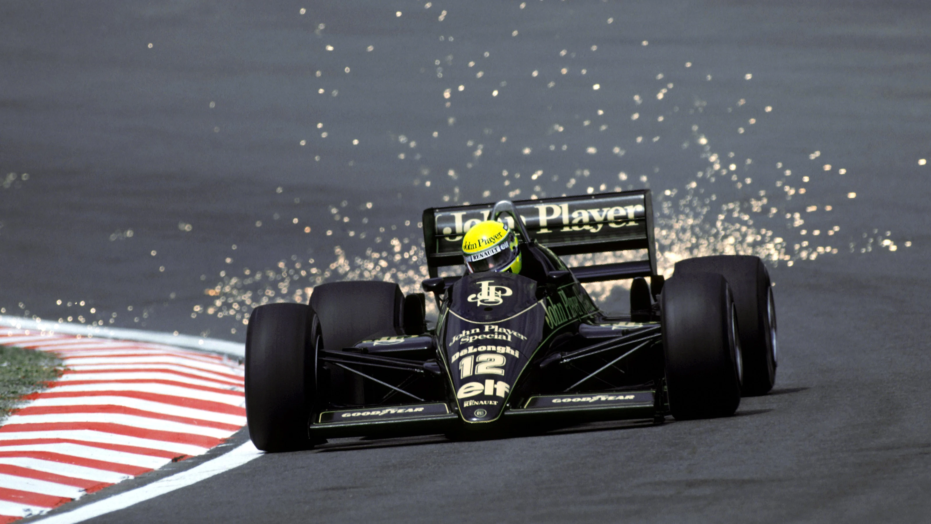Ayrton Senna (BRA) Lotus 98T, who finished the race in second position, sends the sparks flying as