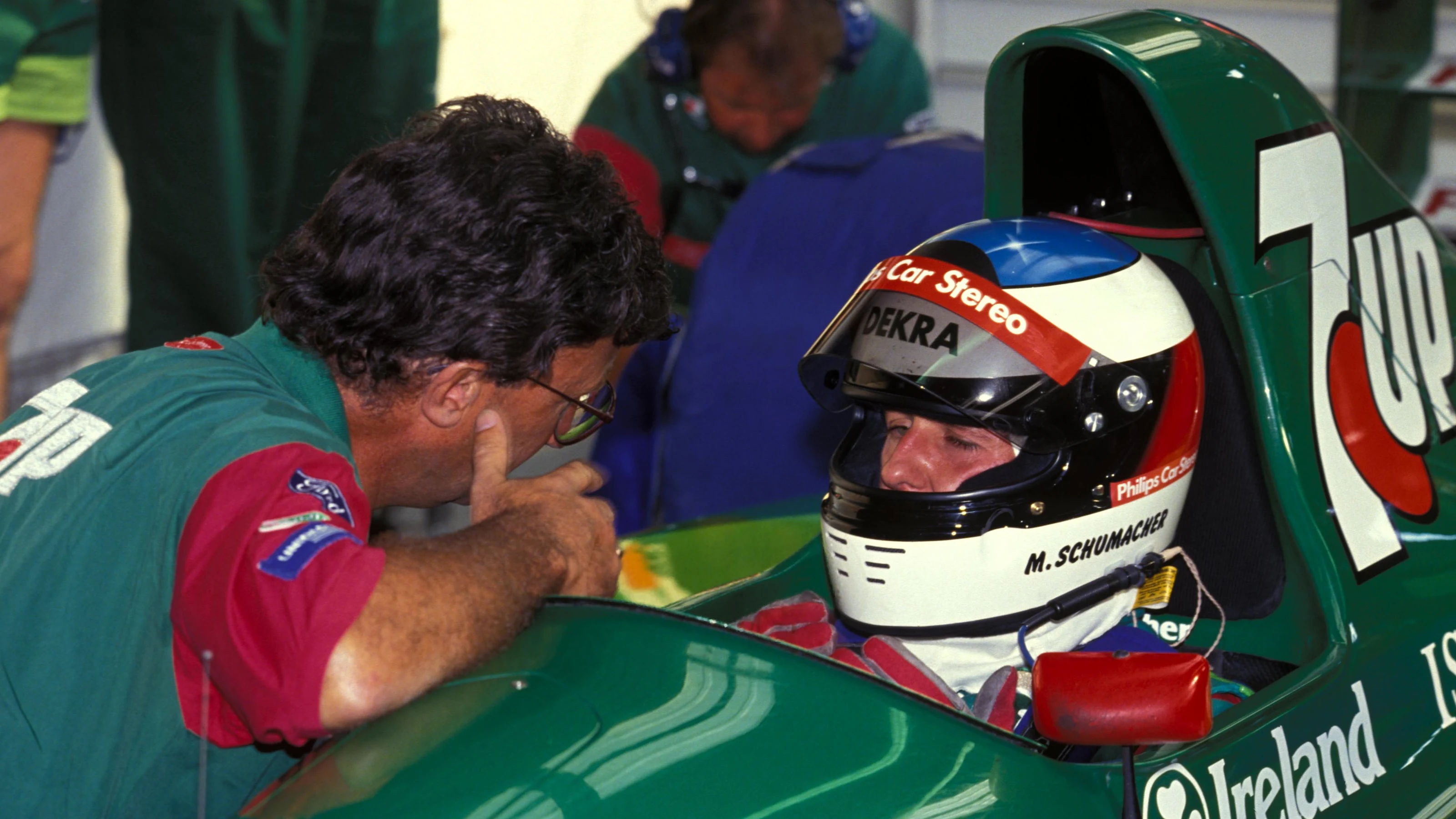 Michael Schumacher (GER) Jordan 191 talks with Eddie Jordan (IRL) Jordan Team owner.   Formula