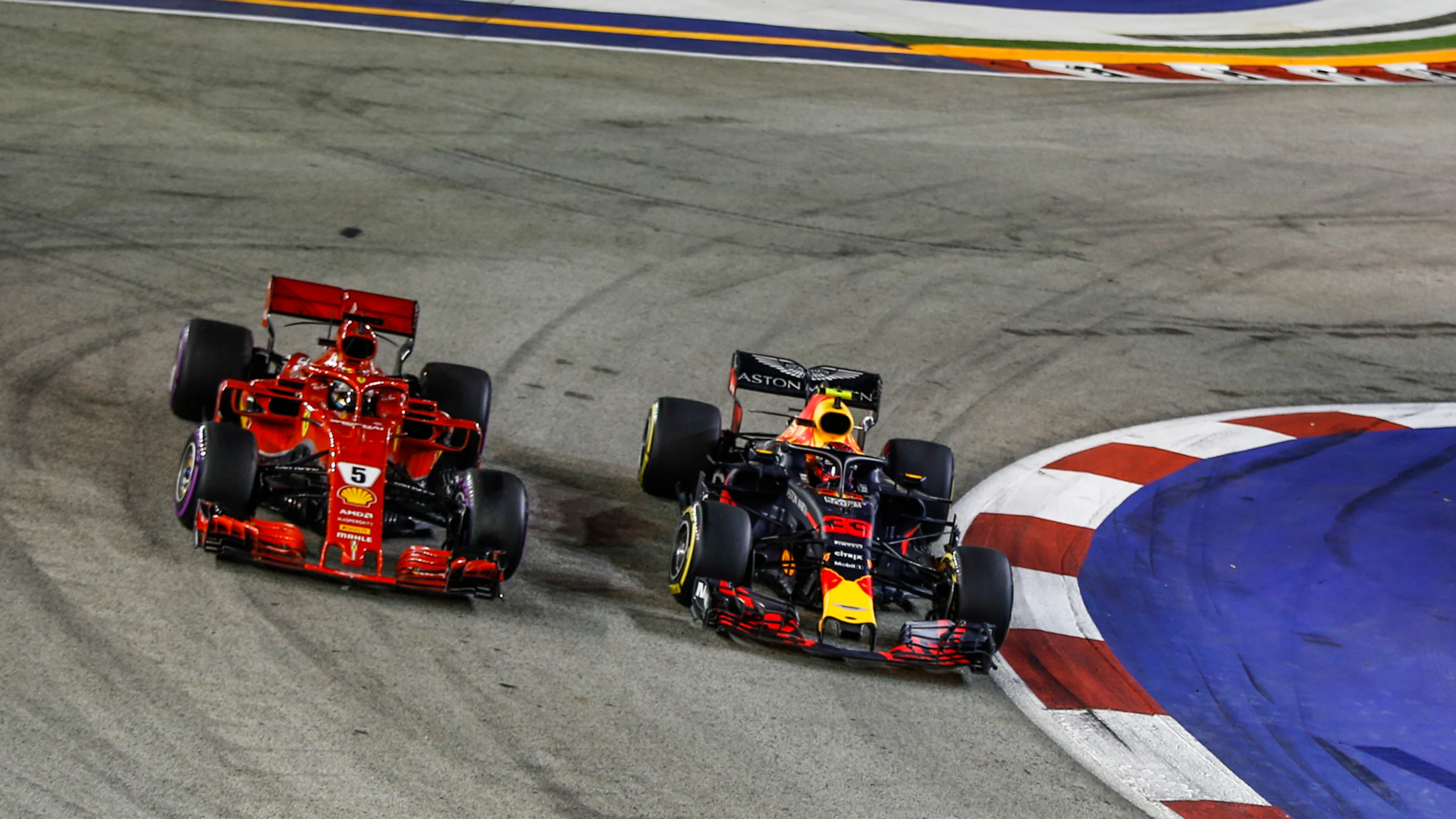 SINGAPORE STREET CIRCUIT, SINGAPORE - SEPTEMBER 16: Sebastian Vettel, Ferrari SF71H and Max