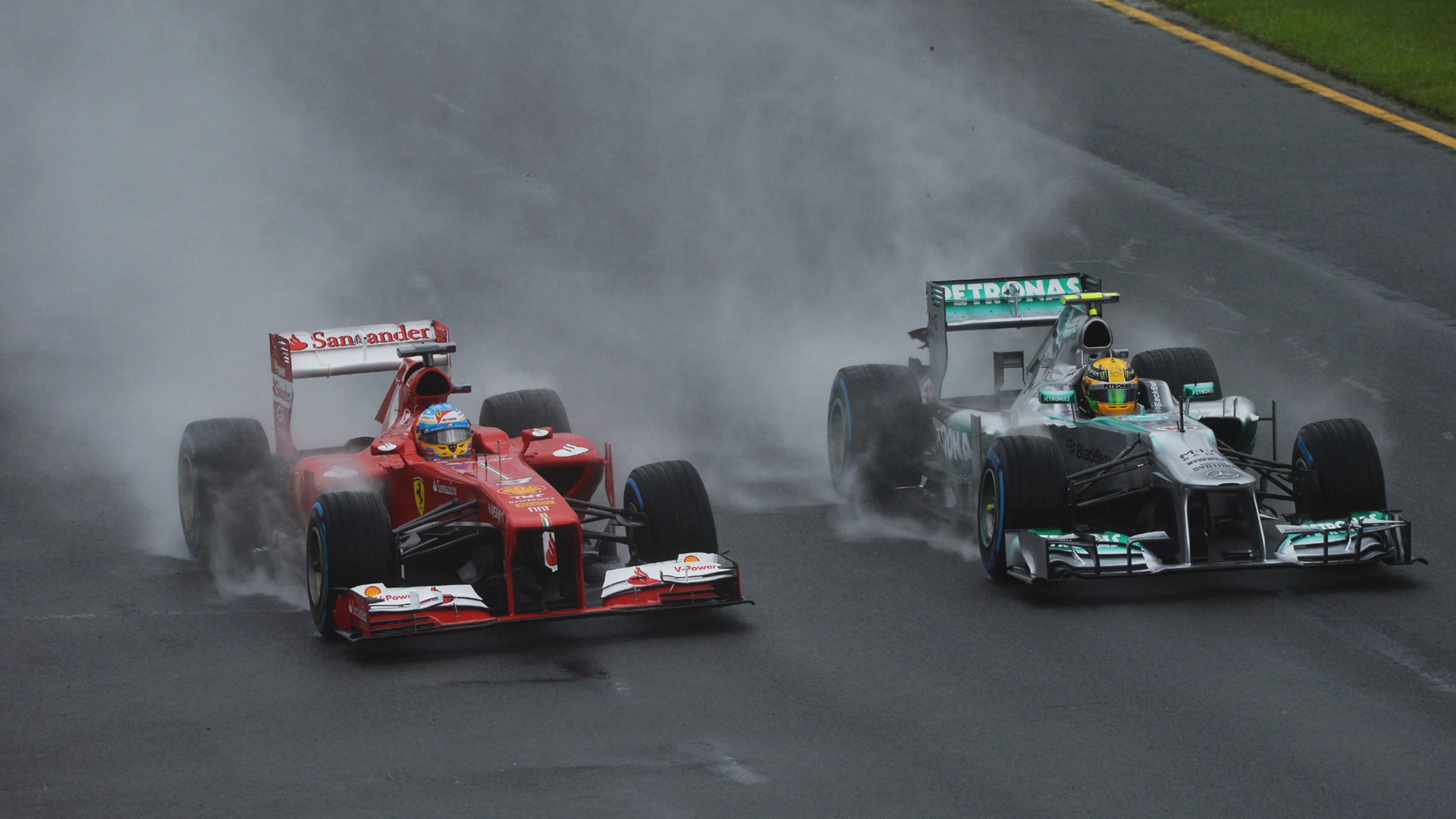 Fernando Alonso (ESP) Ferrari F138 and Lewis Hamilton (GBR) Mercedes AMG F1 W04. Formula One World