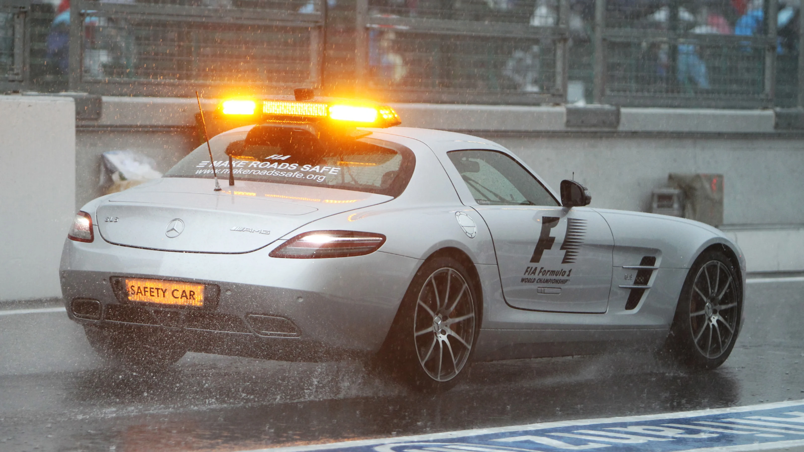 FIA Safety car inspects the wet circuit. Formula One World Championship, Rd 16, Japanese Grand