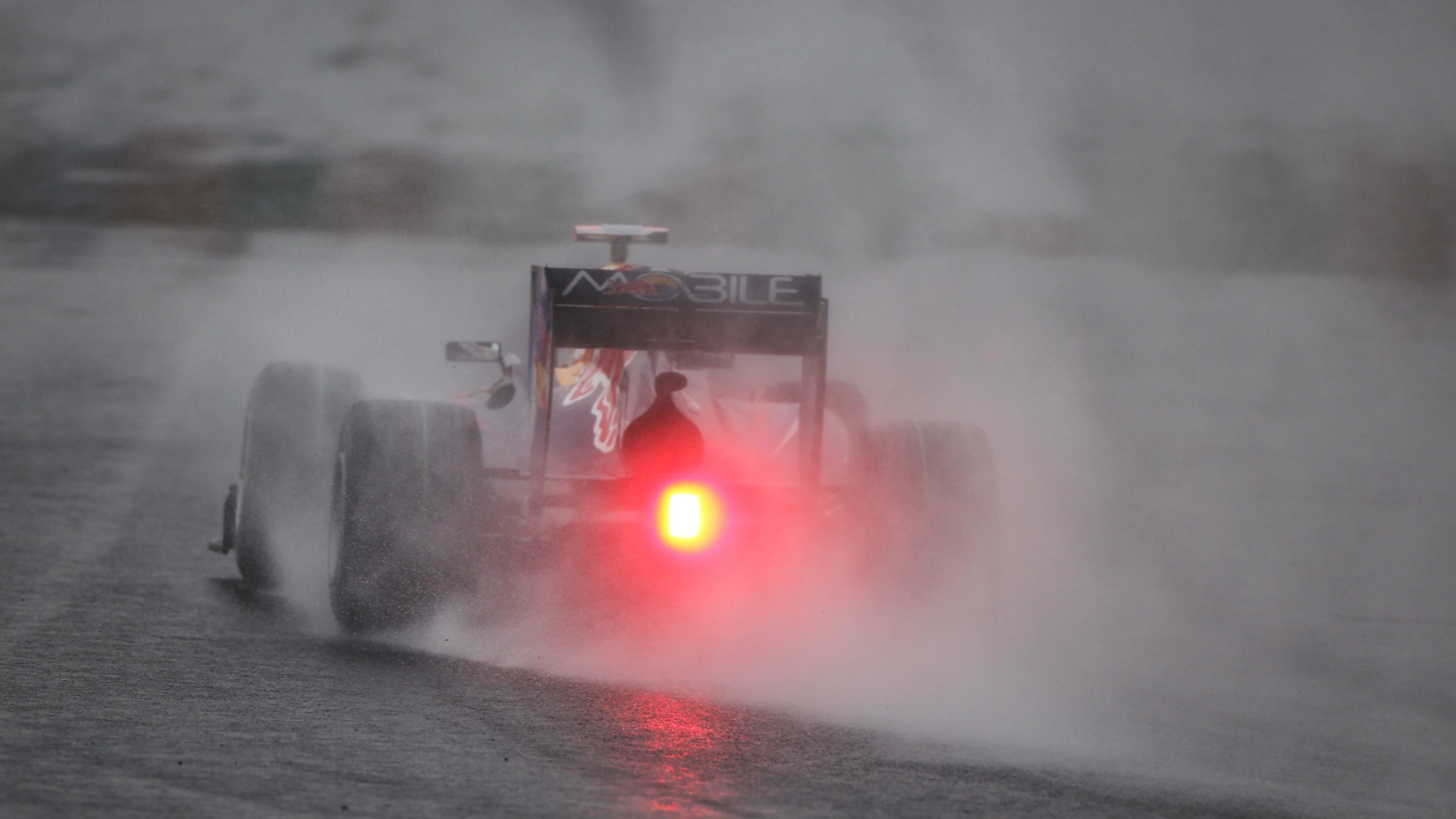 Sebastian Vettel (GER) Red Bull Racing RB6. Formula One World Championship, Rd 16, Japanese