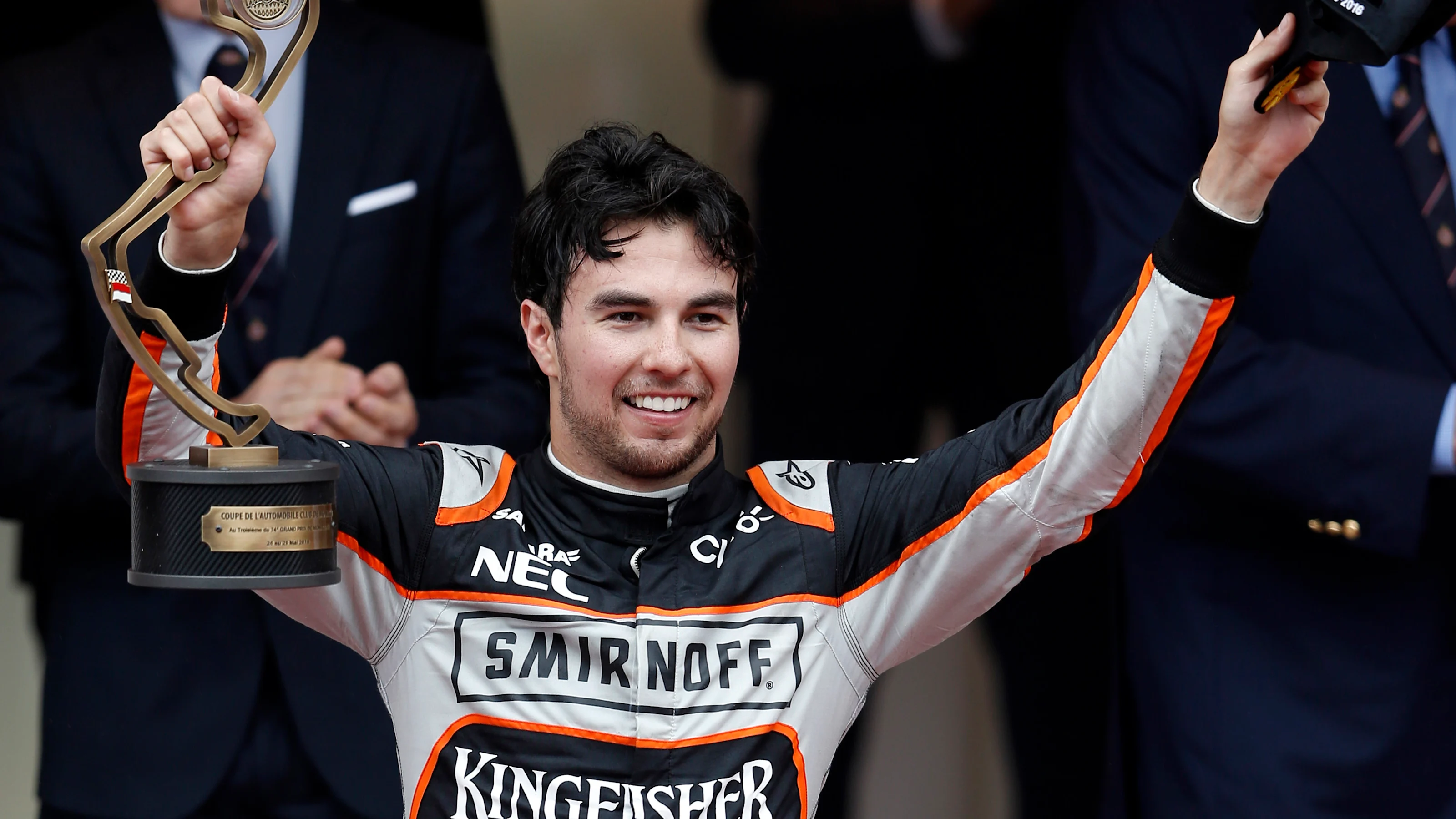 www.sutton-images.com  Sergio Perez (MEX) Force India celebrates on the podium with the trophy on