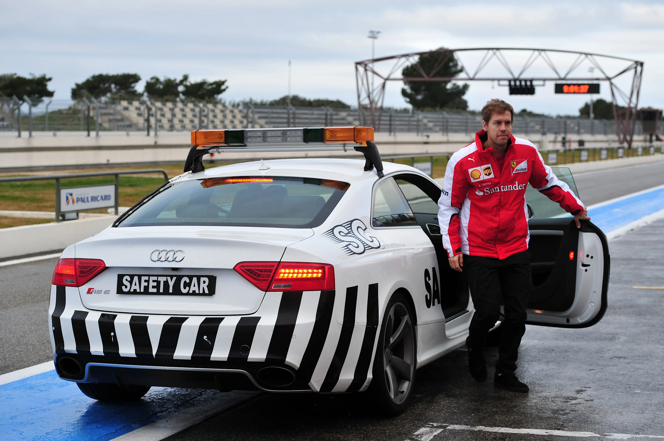 Sebastian Vettel (GER) Ferrari and safety car at Pirelli Formula One Wet Test, Day Two, Paul