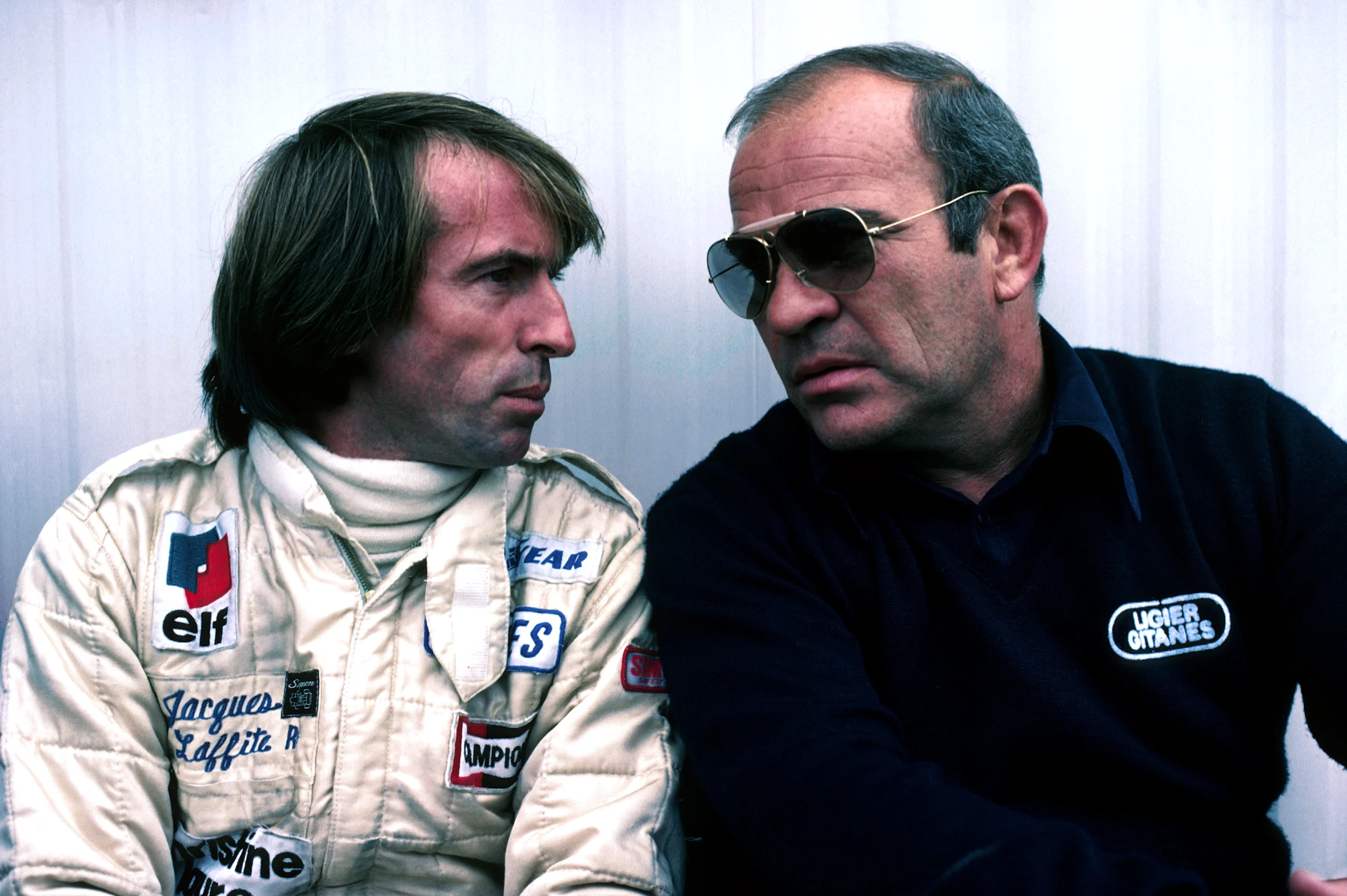 (L to R): Jacques Laffite (FRA) Ligier, who retired from the race on lap 6 with a blown engine,
