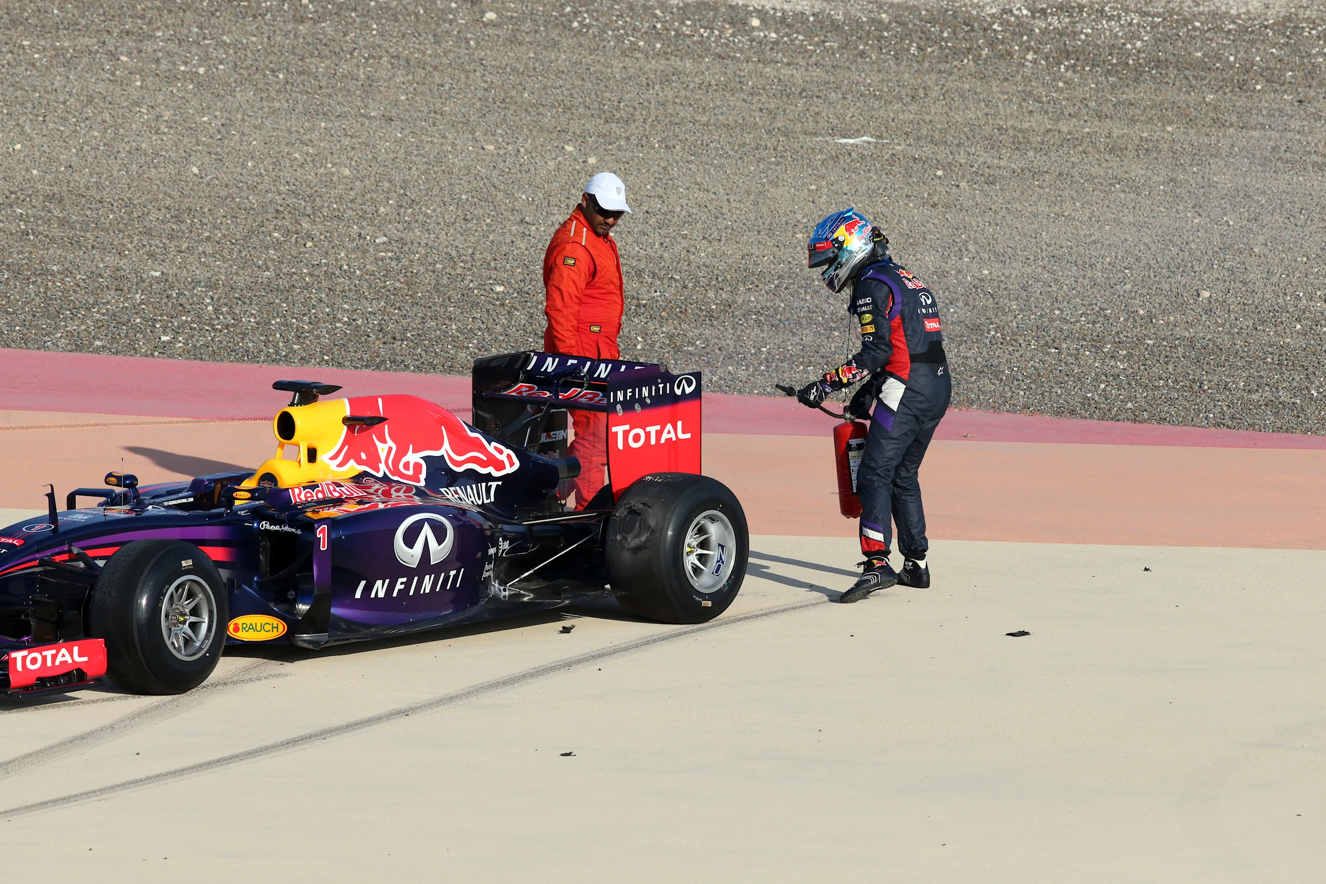 Sebastian Vettel (GER) Red Bull Racing RB10 stops out on track. Formula One Testing, Day One,