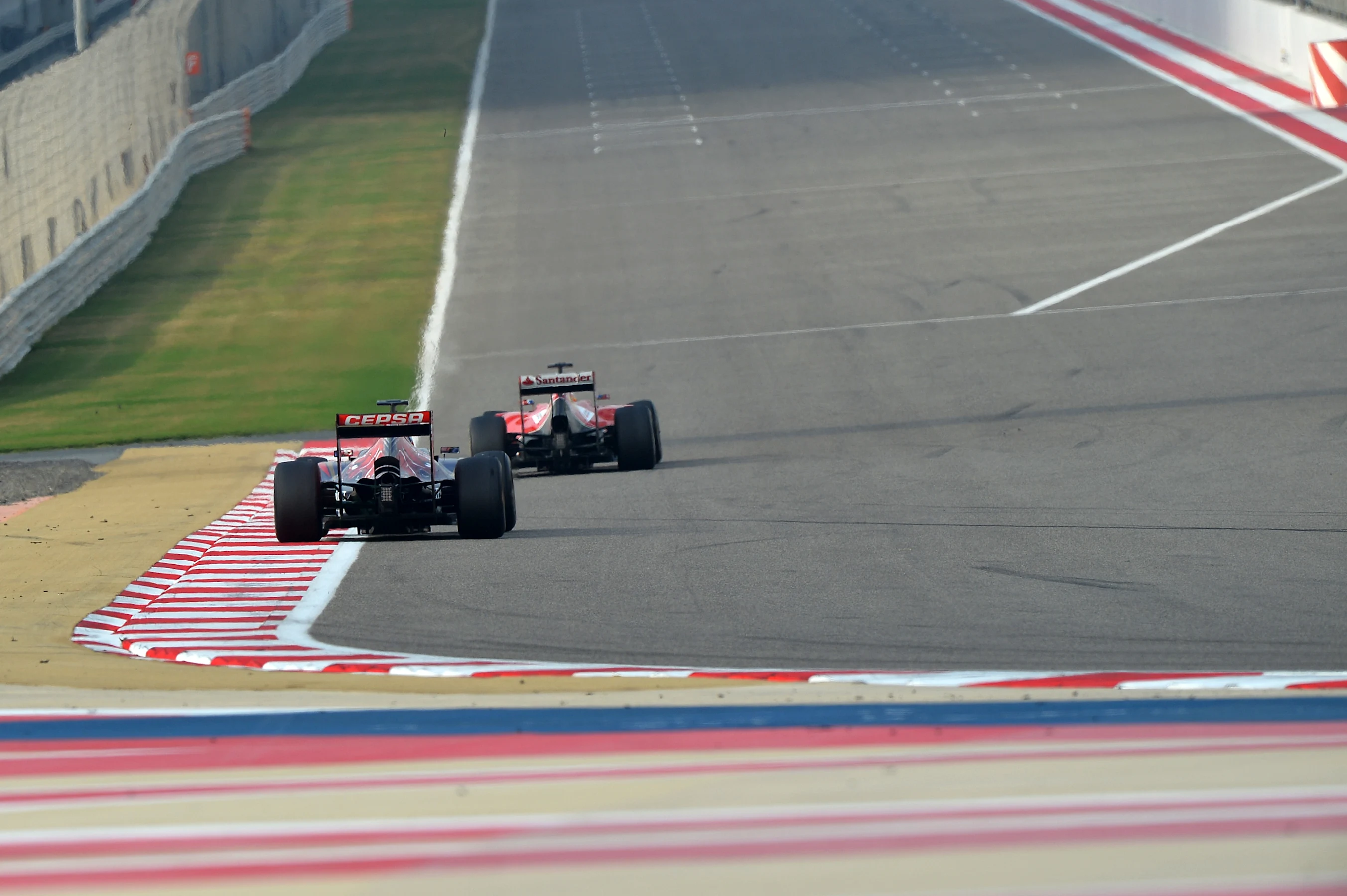 Fernando Alonso (ESP) Ferrari F14 T leads Jean-Eric Vergne (FRA) Scuderia Toro Rosso STR9.Formula