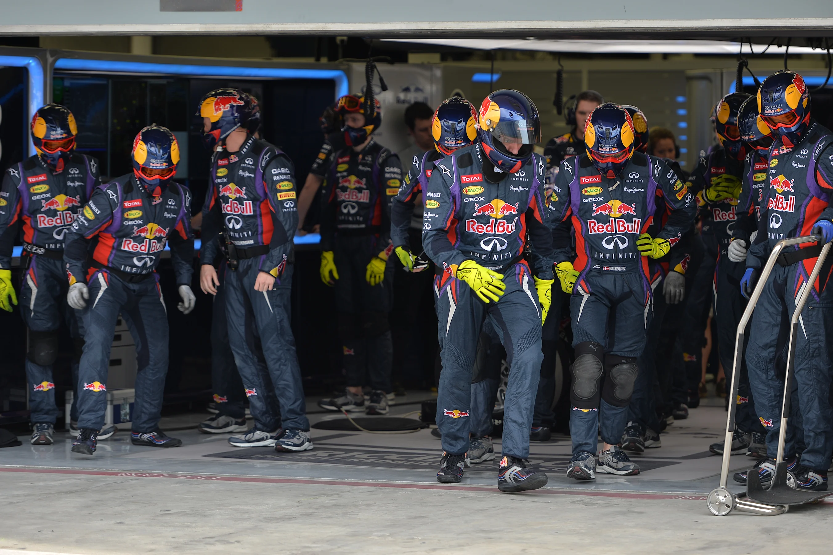 Red Bull Racing mechanics prepare for a pit stop.Formula One Testing, Day Two, Bahrain