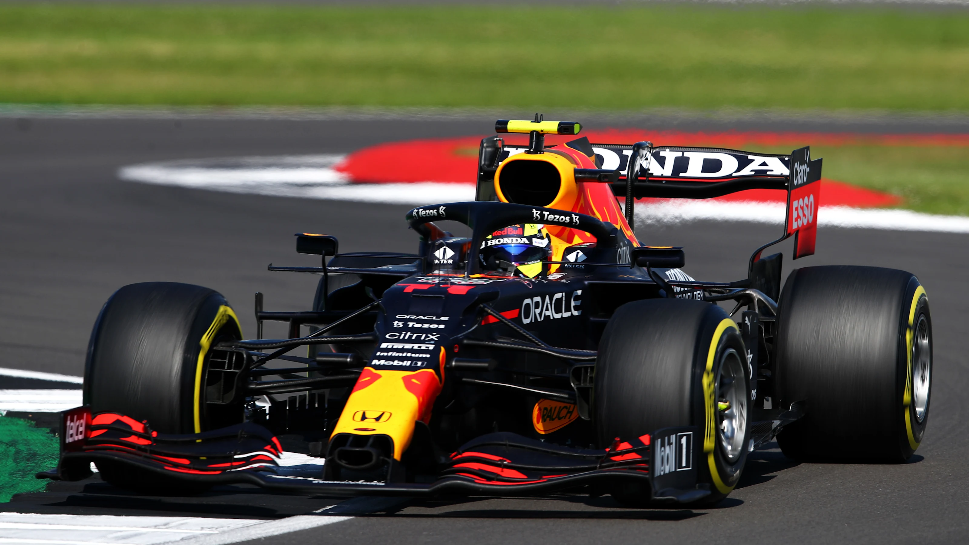 NORTHAMPTON, ENGLAND - JULY 18: Sergio Perez of Mexico driving the (11) Red Bull Racing RB16B Honda