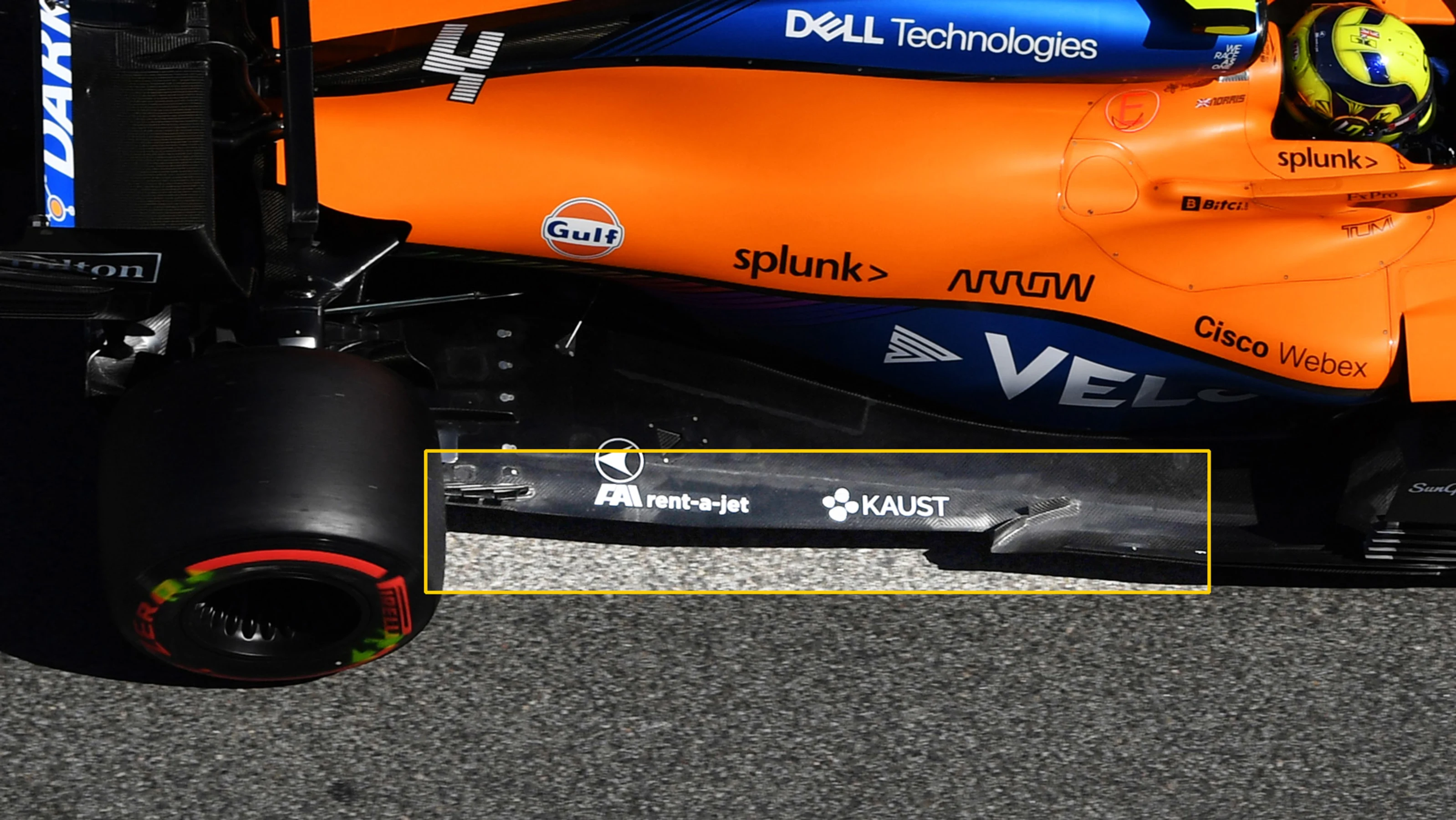 Lando Norris, McLaren MCL35M, in the pit