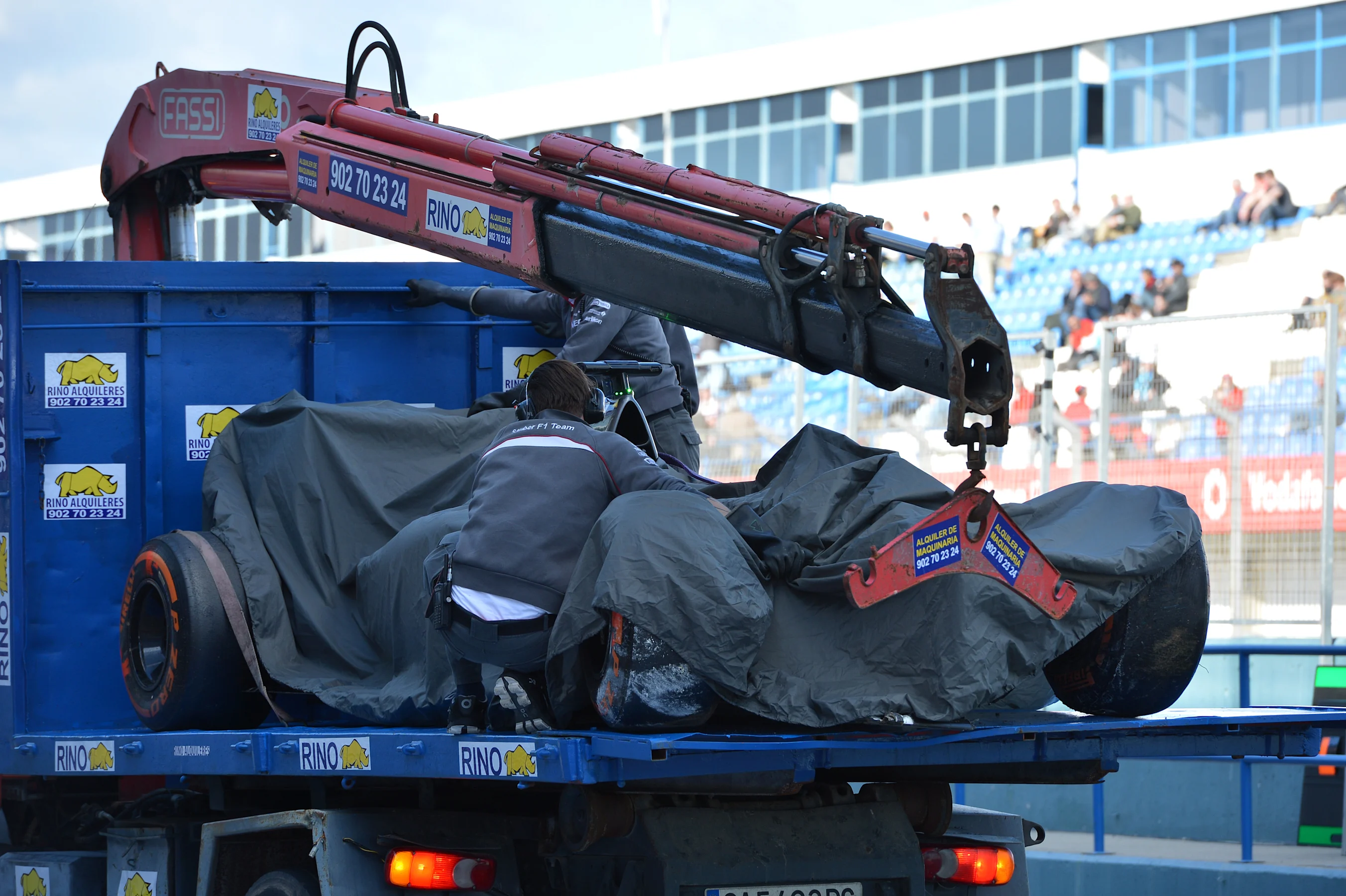 The crashed car of Adrian Sutil (GER) Sauber C33 is recovered on a truck.Formula One Testing,