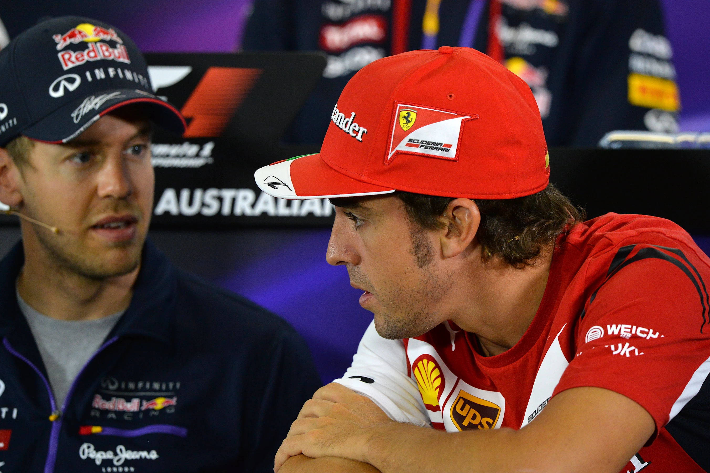 Sebastian Vettel (GER) Red Bull Racing and Fernando Alonso (ESP) Ferrari in the Press Conference.