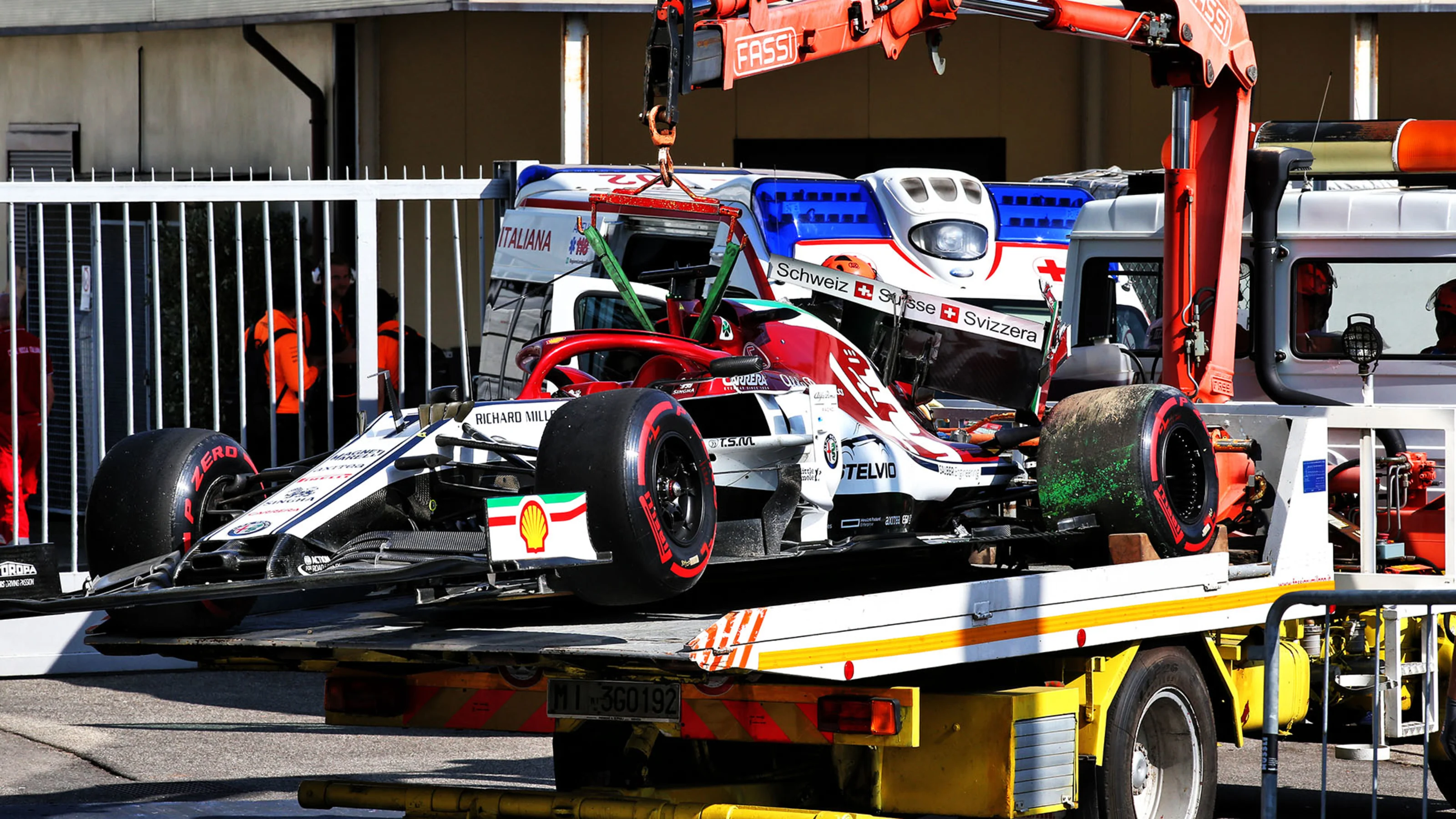 The Alfa Romeo Racing C38 of Kimi Raikkonen (FIN) Alfa Romeo Racing is recovered back to the pits
