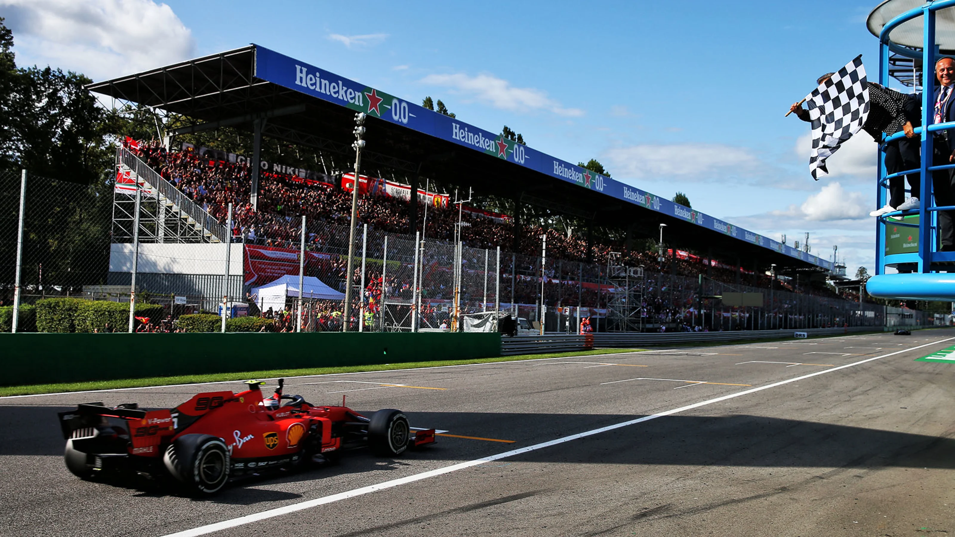 Race winner Charles Leclerc (MON) Ferrari SF90 takes the chequered flag at the end of the