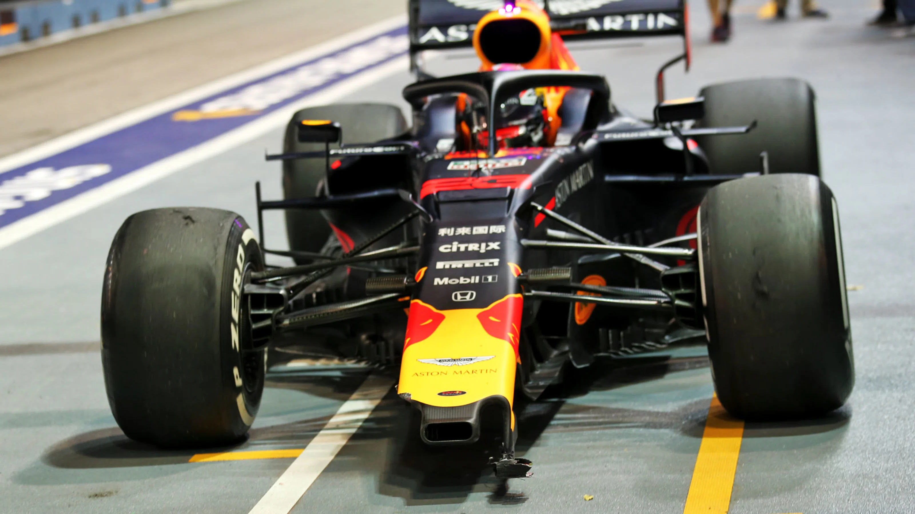 Alexander Albon (THA) Red Bull Racing RB15 with a broken front wing in the second practice