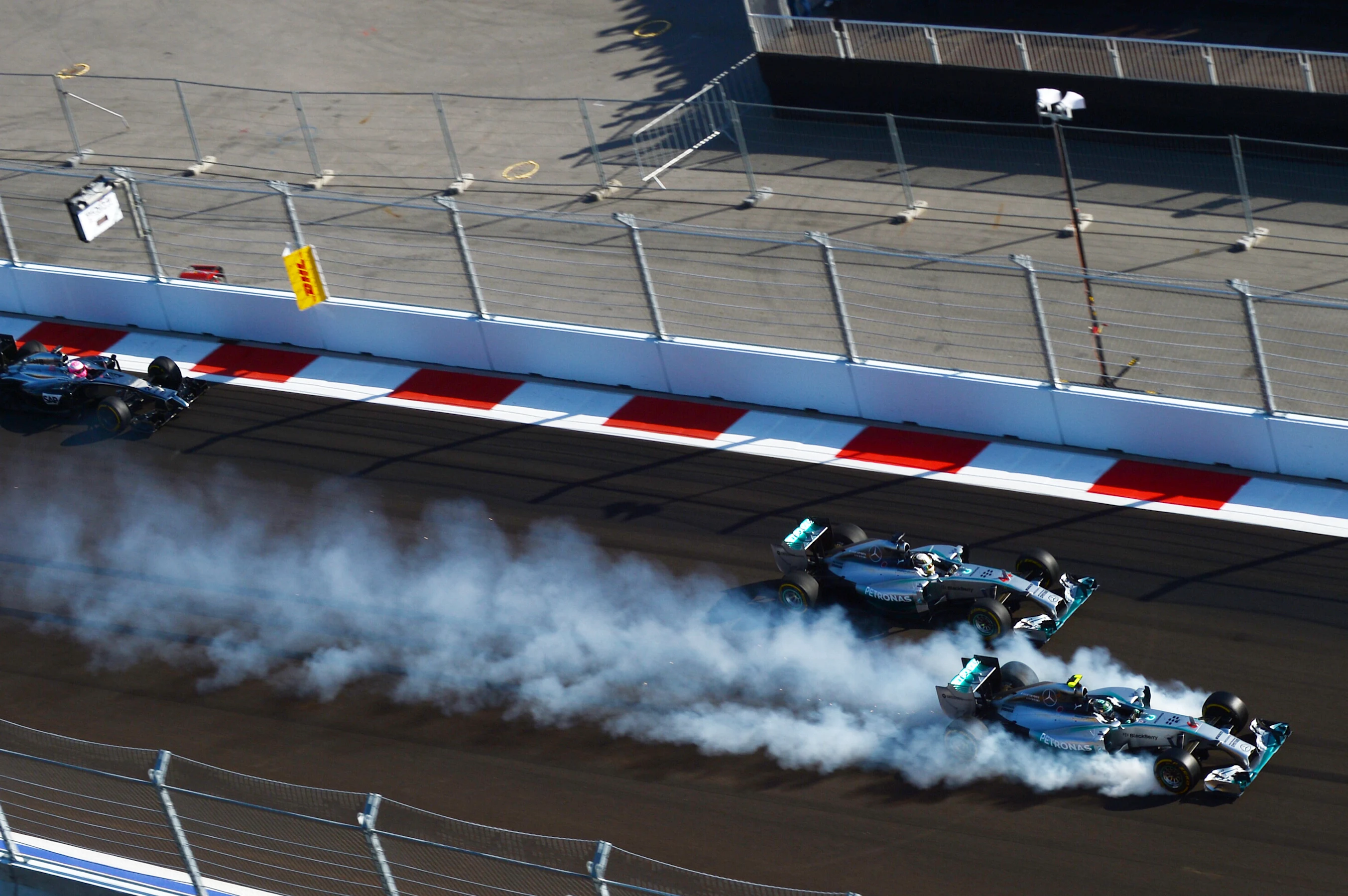 Nico Rosberg (GER) Mercedes AMG F1 W05 locks up inside Lewis Hamilton (GBR) Mercedes AMG F1 W05 at