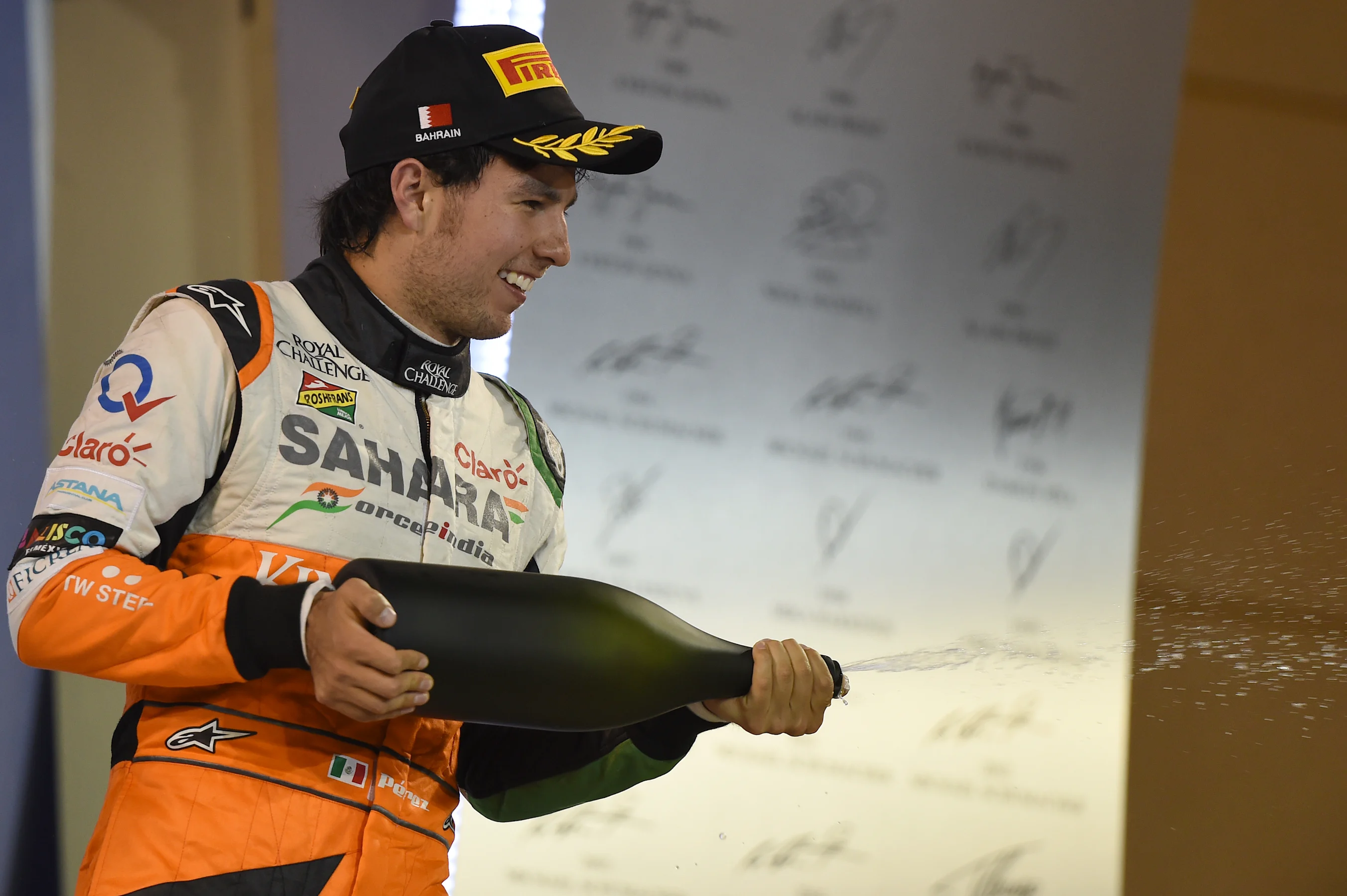 Sergio Perez (MEX) Force India celebrates on the podium. Formula One World Championship, Rd3,