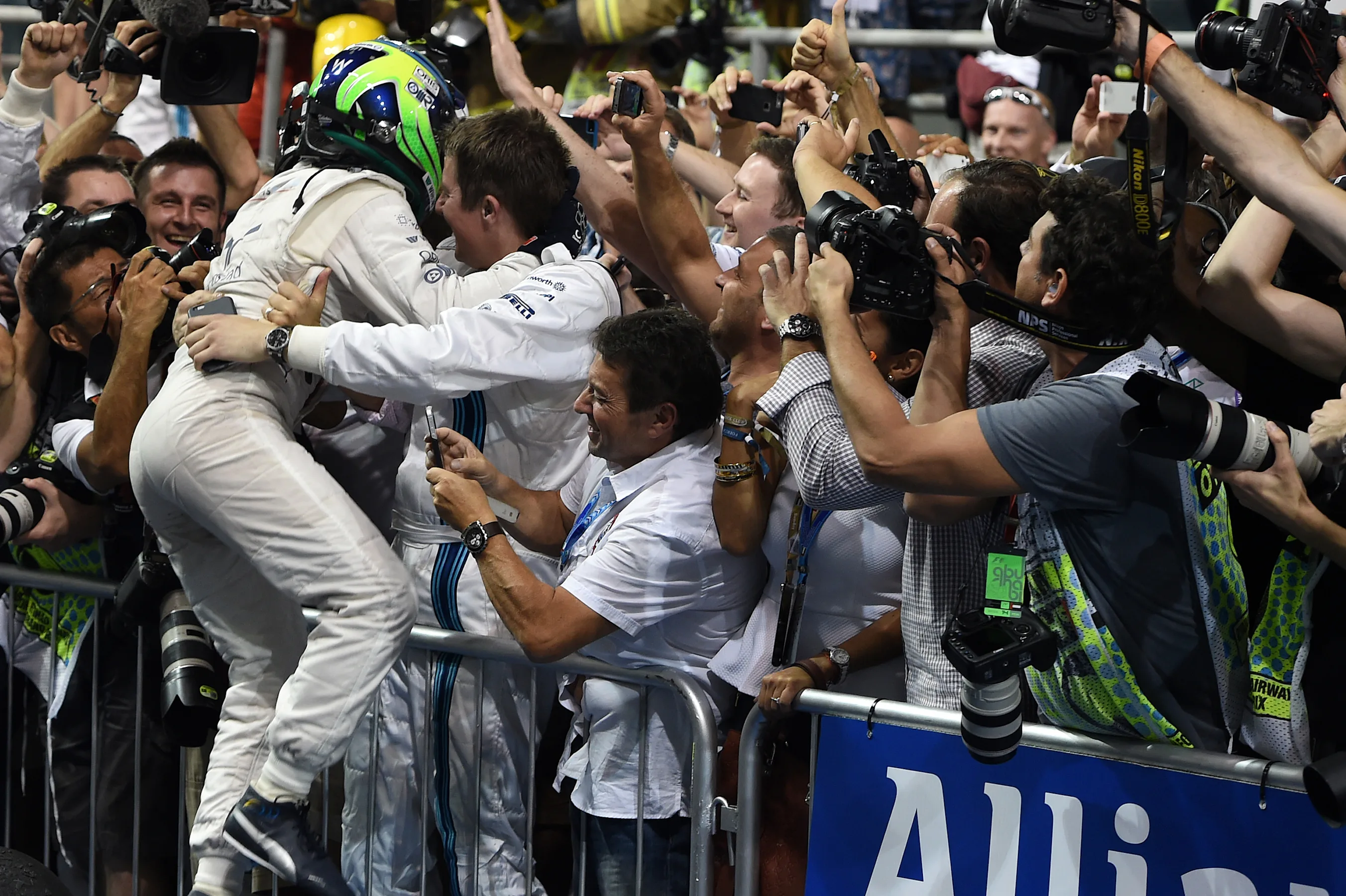 Felipe Massa (BRA) Williams celebrates in parc ferme. Formula One World Championship, Rd19, Abu