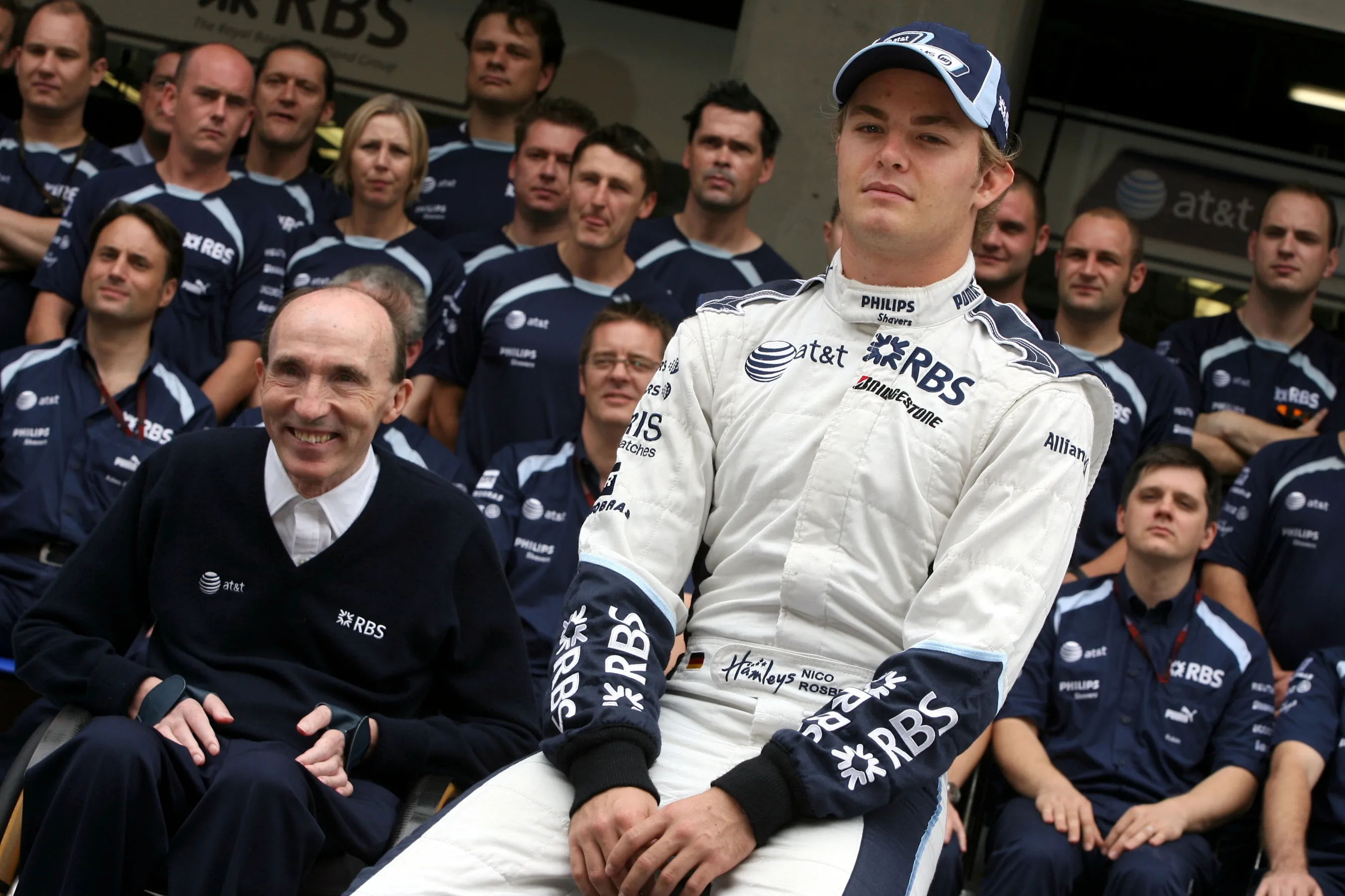 Frank Williams (GBR) Williams Team Owner and Nico Rosberg (GER) Williams. Formula One World
