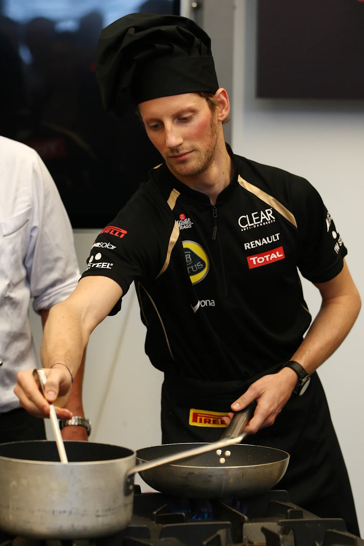 Romain Grosjean (FRA) Lotus F1 at the launch of the Pirelli Miles and Meals book. Formula One