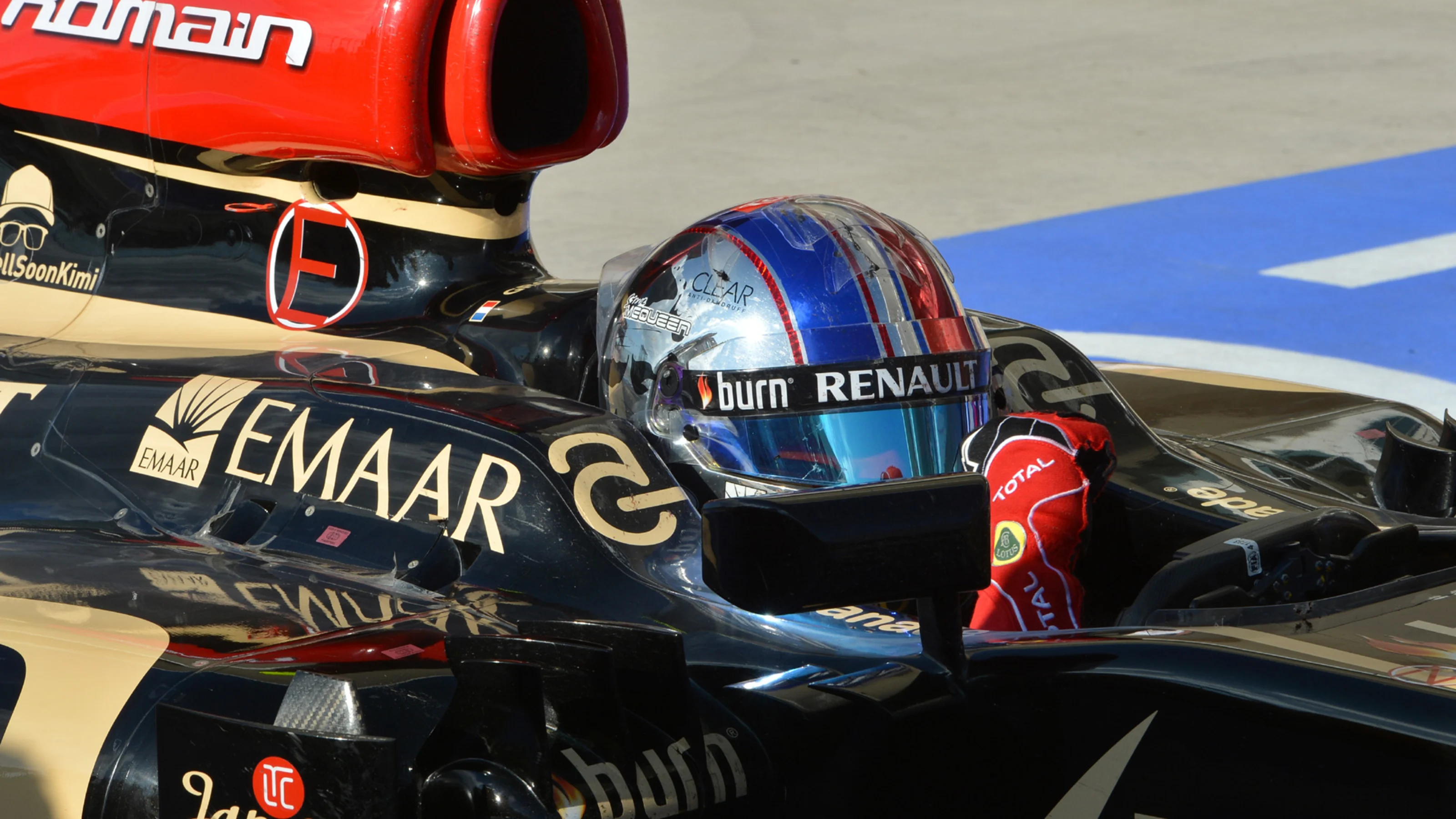 Second placed Romain Grosjean (FRA) Lotus E21 celebrates in parc ferme. Formula One World