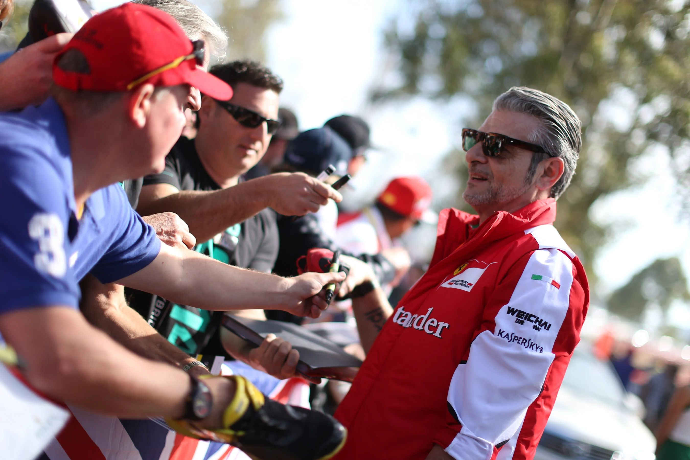 Maurizio Arrivabene (ITA) Ferrari Team Principal signs autographs for the fans at Formula One World