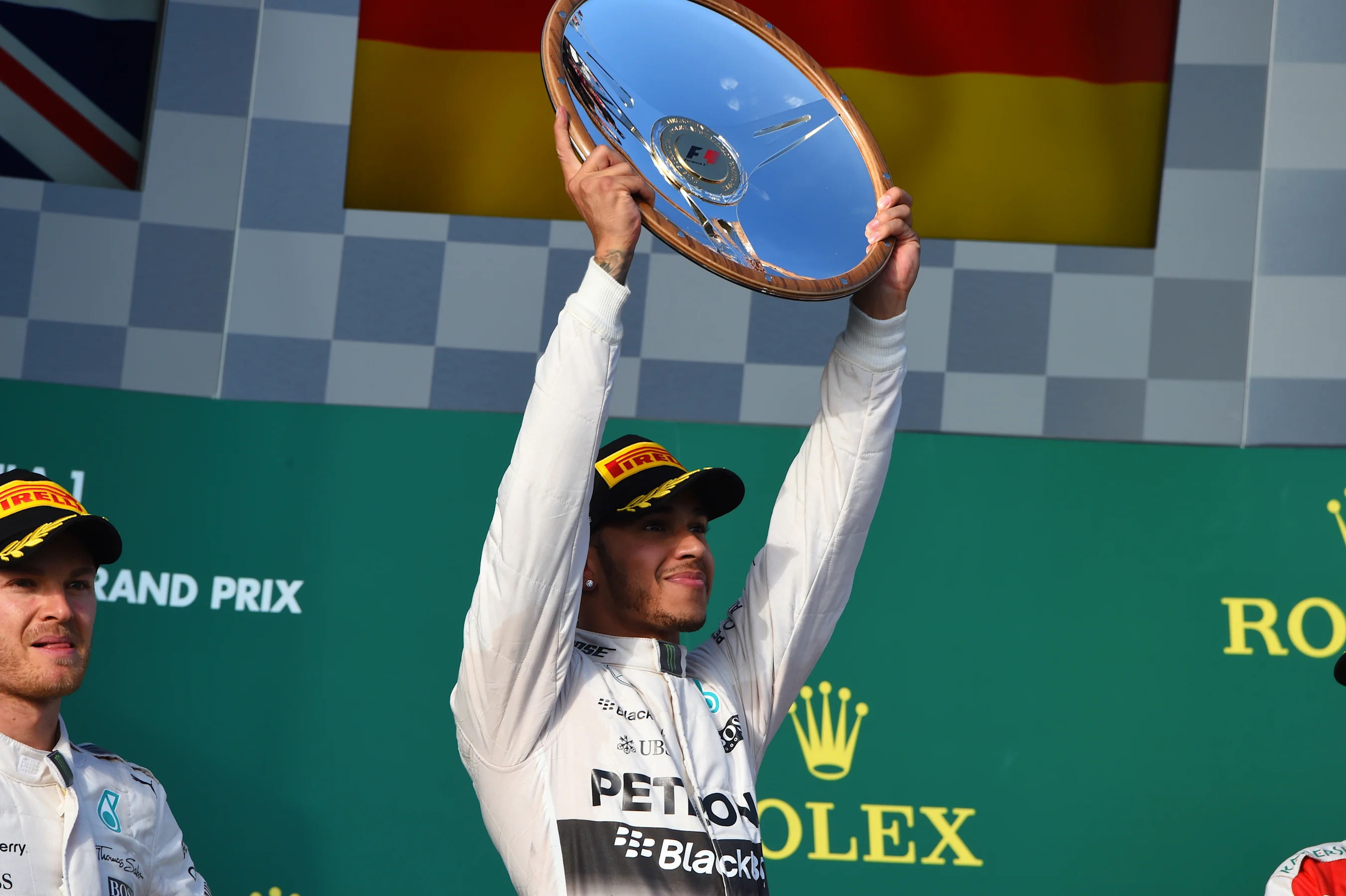 Race winner Lewis Hamilton (GBR) Mercedes AMG F1 celebrates with the trophy on the podium at