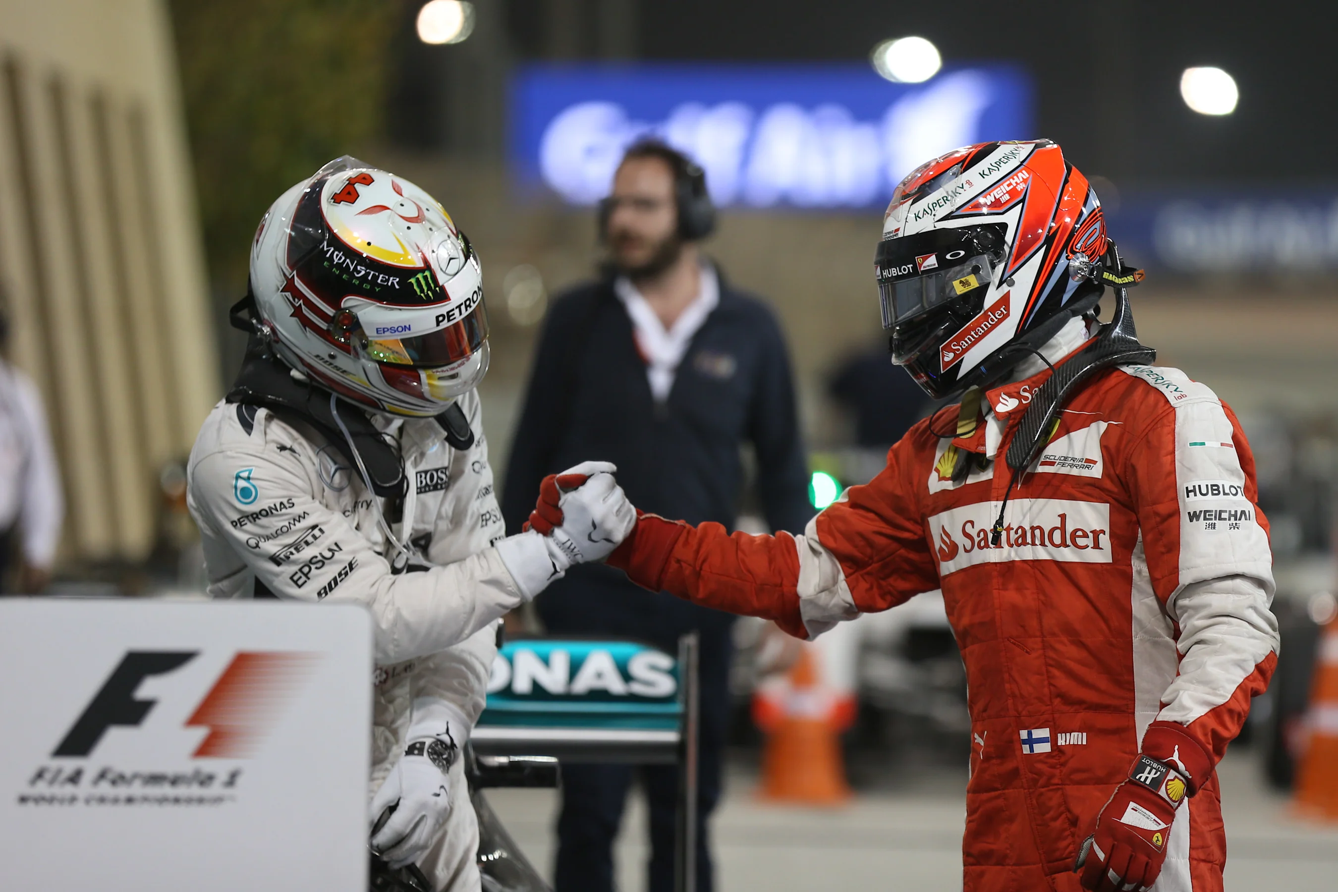 Lewis Hamilton (GBR) Mercedes AMG F1 and Kimi Raikkonen (FIN) Ferrari SF15-T celebrate in parc