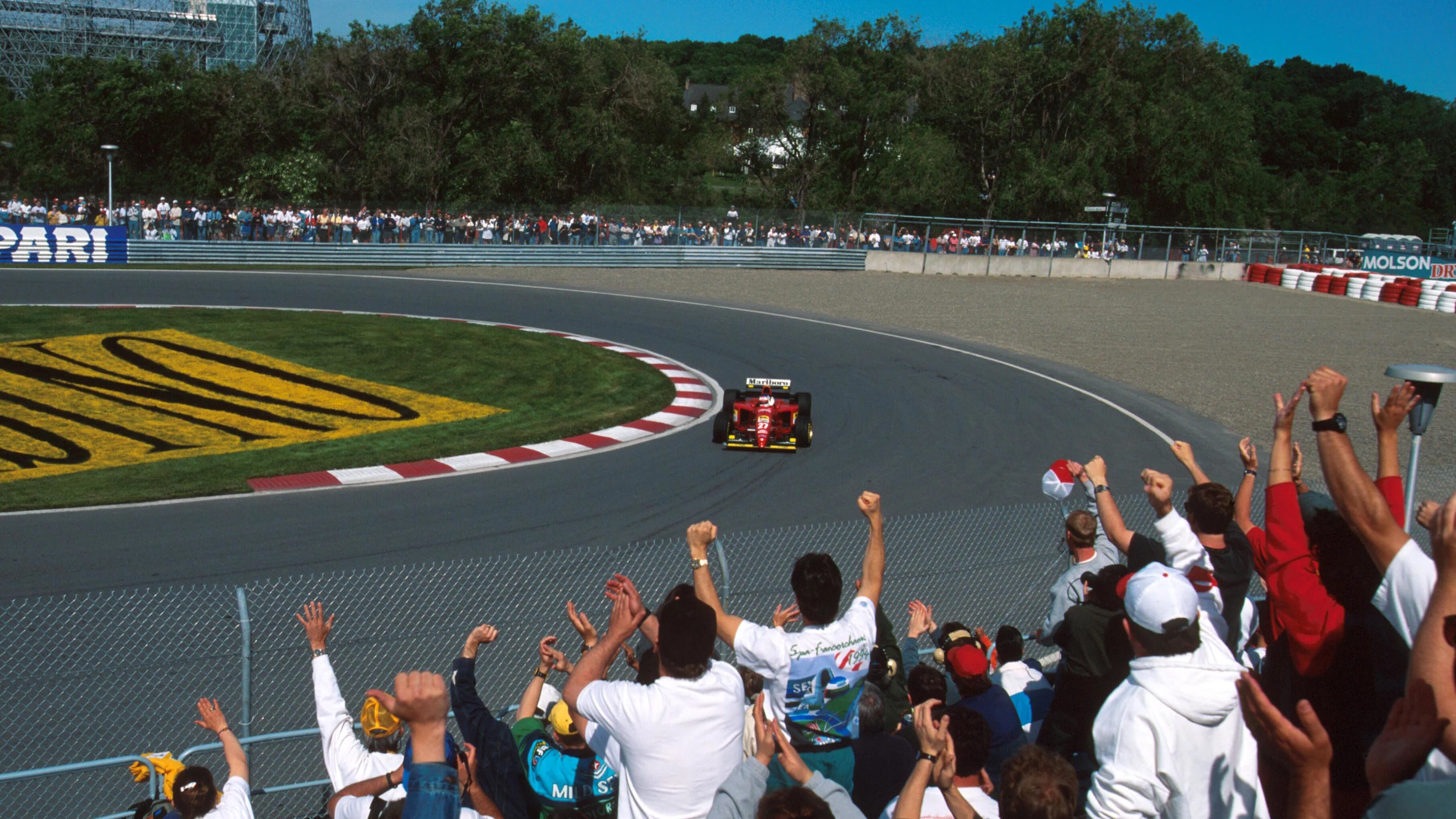 The fans cheer Alesi on the way to his first win. Canadian Grand Prix, Montreal, 11th June 1995