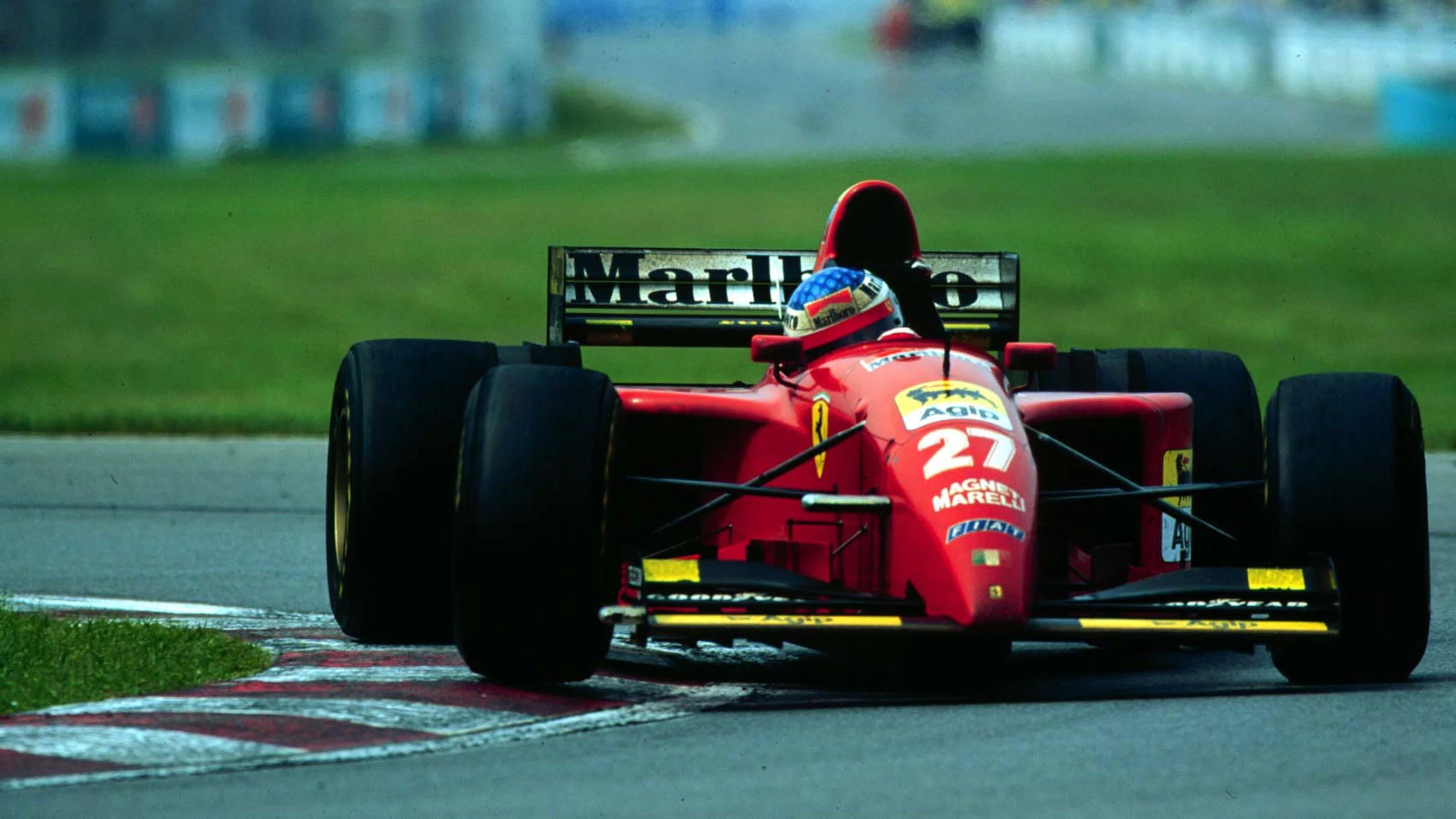1995 CANADIAN GP. Jean Alesi, Ferrari wins the first race of his career in Montreal. Photo: LAT