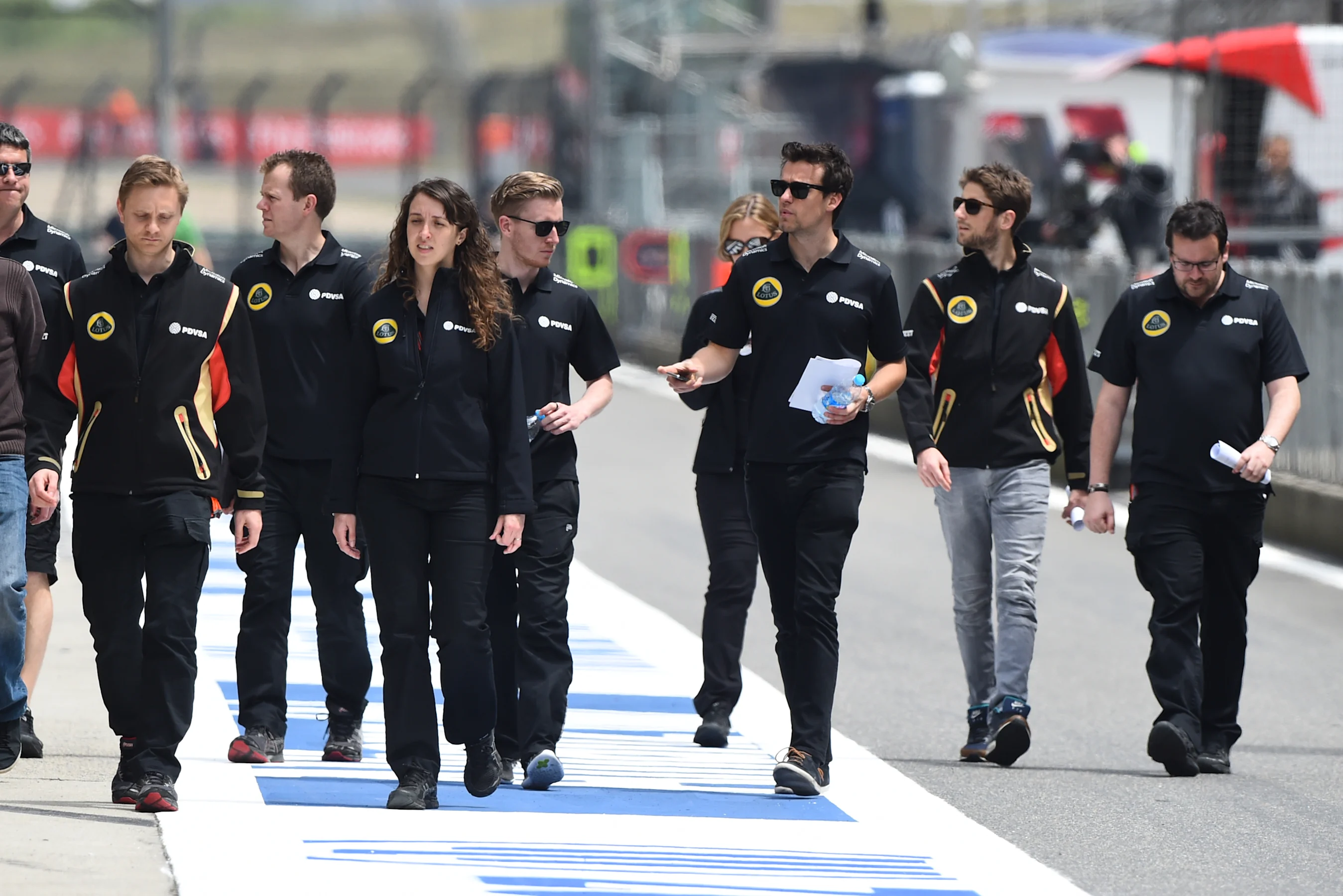 Jolyon Palmer (GBR) Lotus Test and Reserve Driver and Romain Grosjean (FRA) Lotus at Formula One